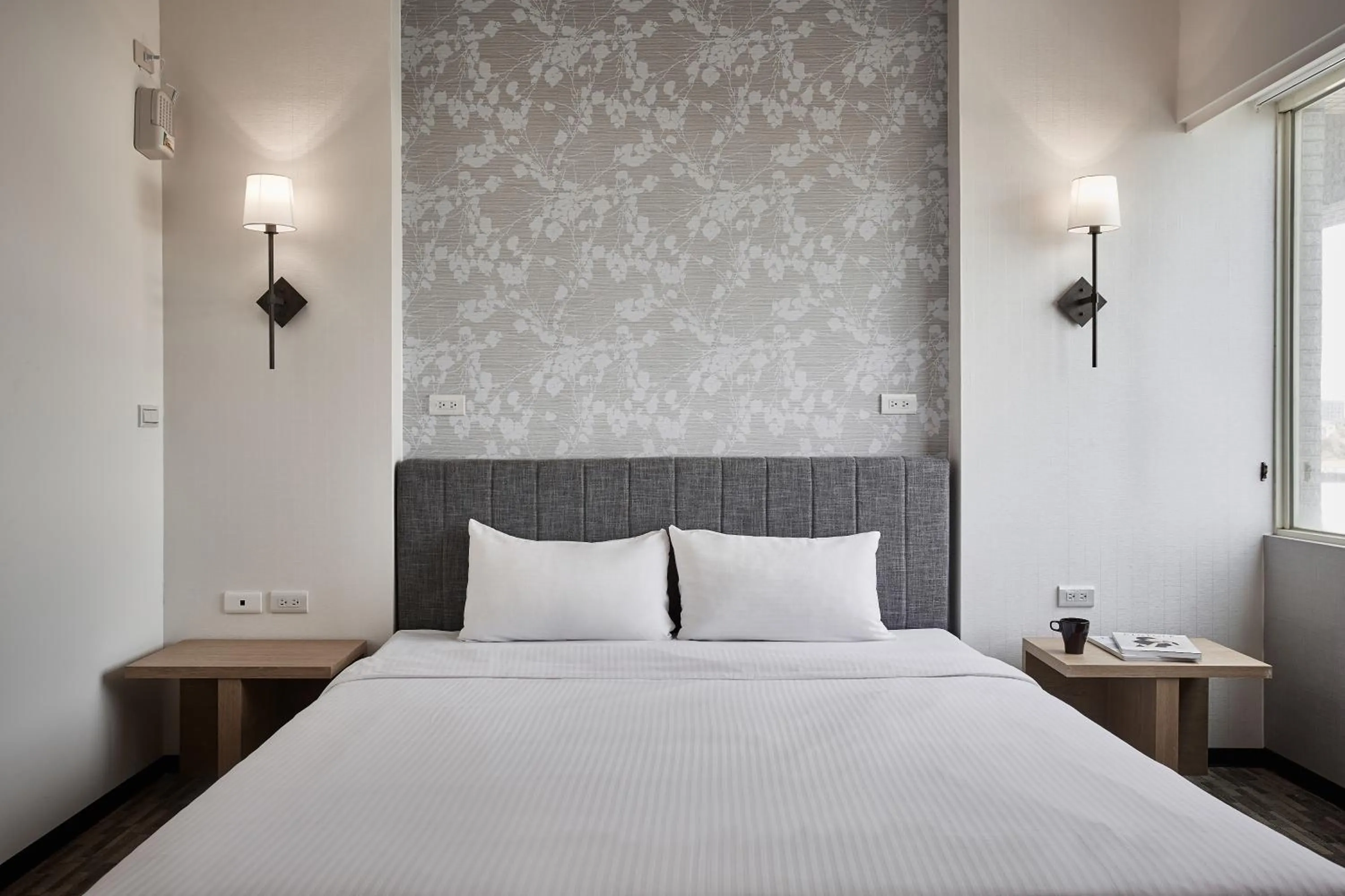 Bed in Kenting City Gate Hotel