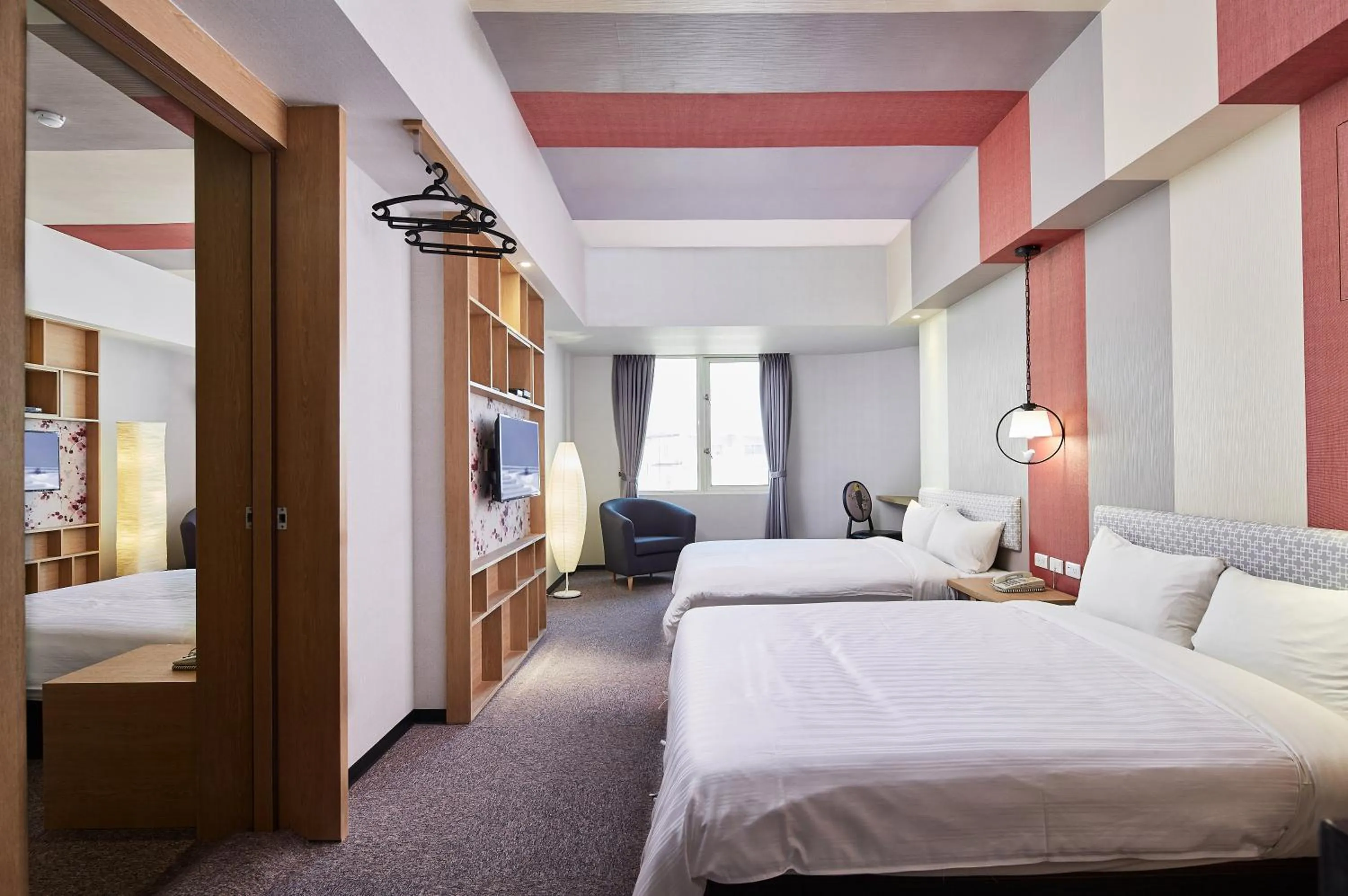 Bed in Kenting City Gate Hotel