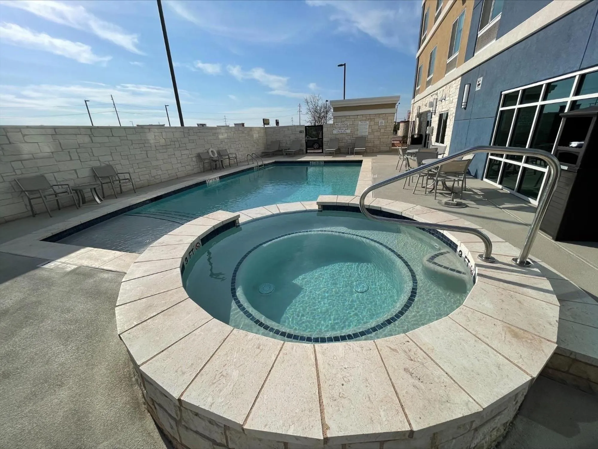 Swimming pool in AmericInn by Wyndham San Angelo