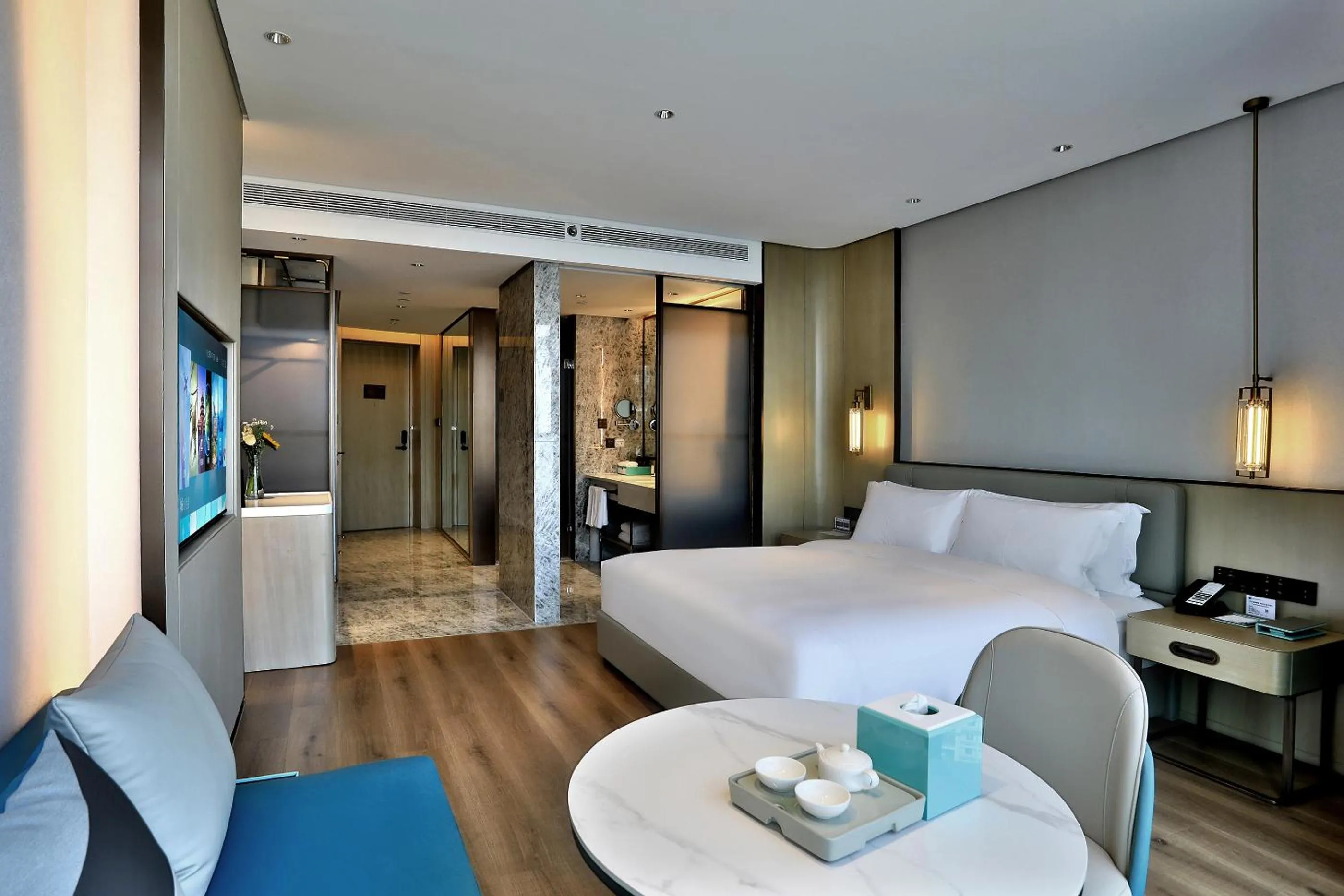 Living room, Bed in Wyndham Garden Hangzhou Yuhang