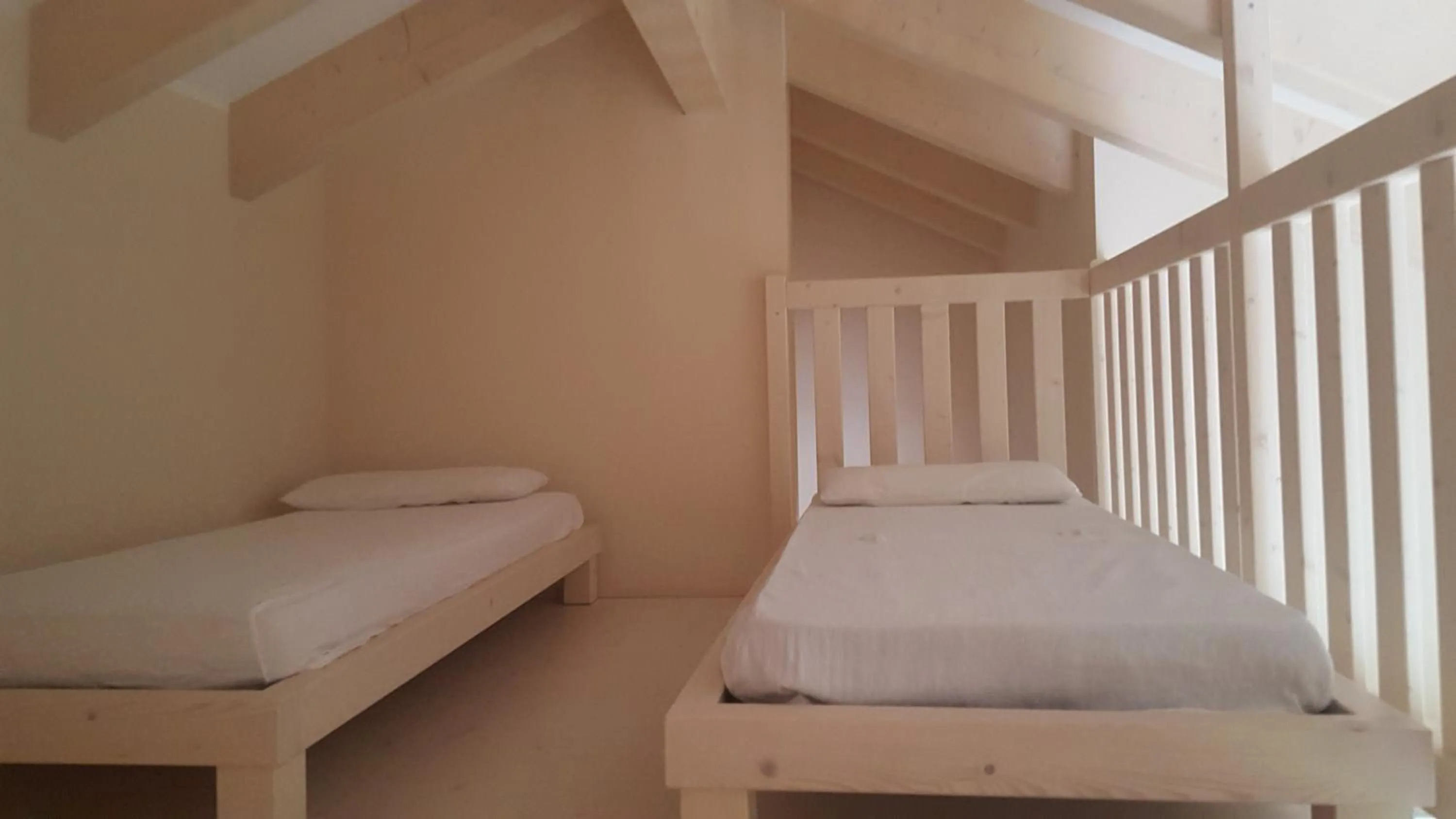 Bed in Hotel Dolomiti