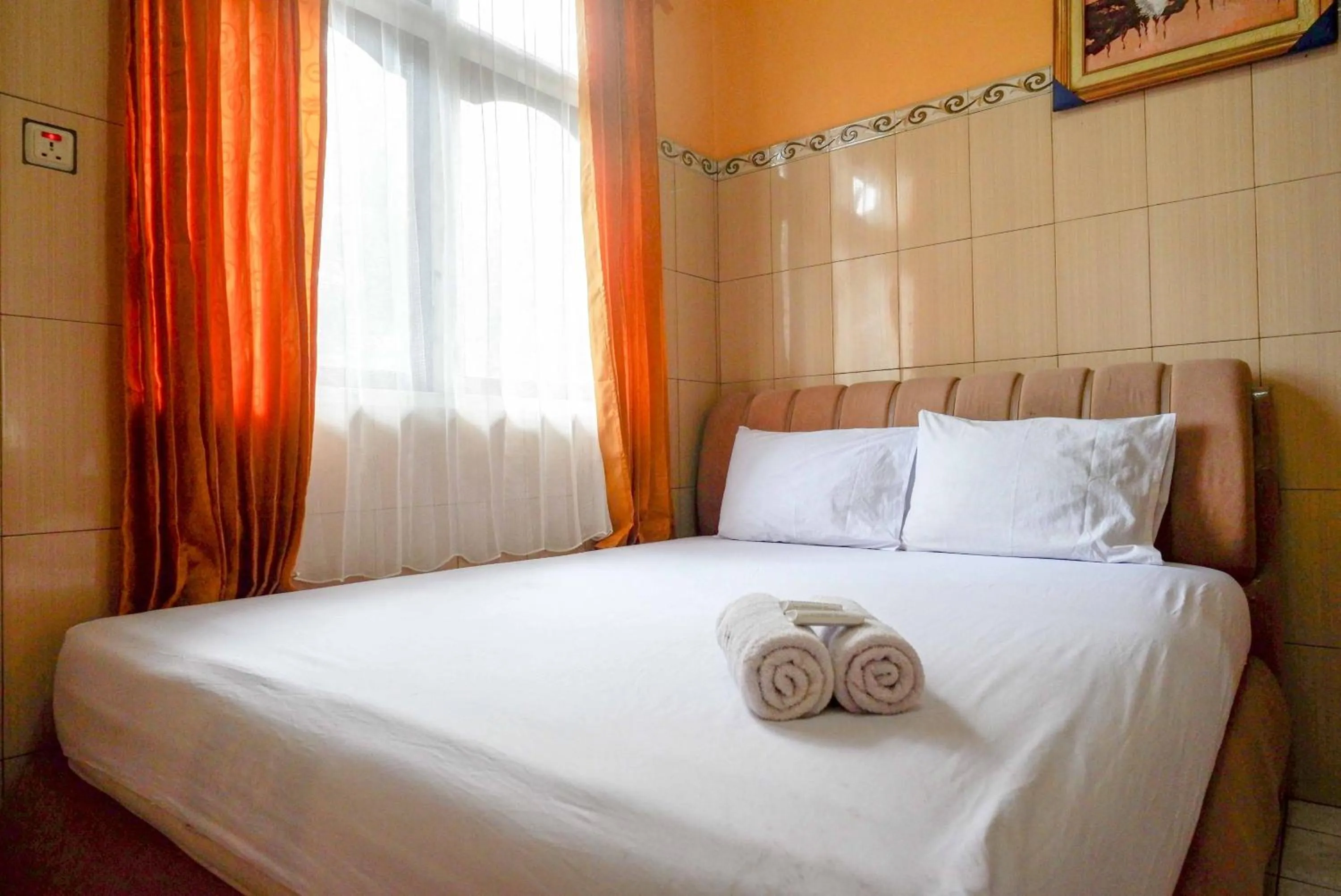 Bed in Urbanview Hotel Anugrah Kendal by RedDoorz