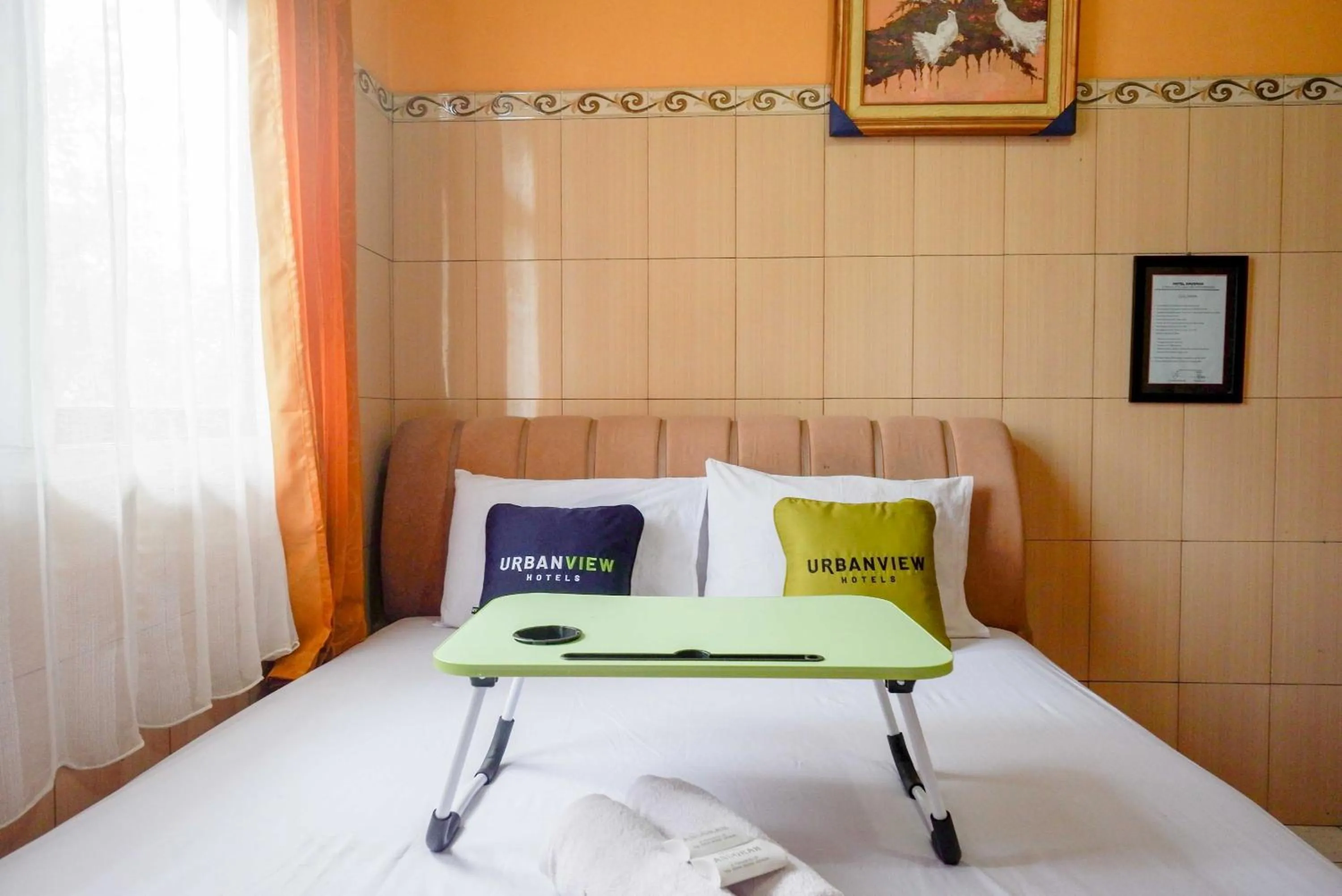 Bed in Urbanview Hotel Anugrah Kendal by RedDoorz