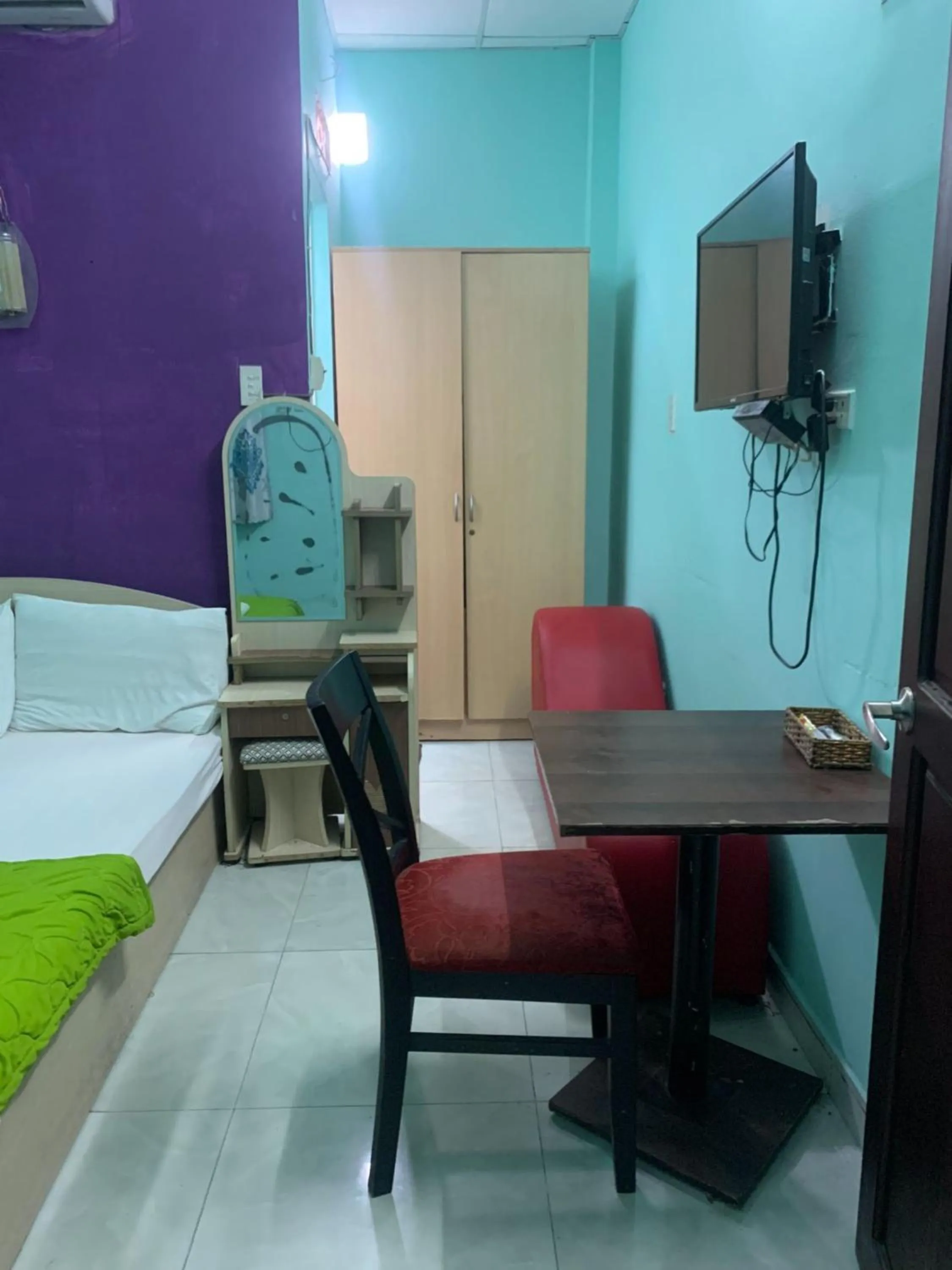 Communal lounge/ TV room in Happy Hotel Binh Tan