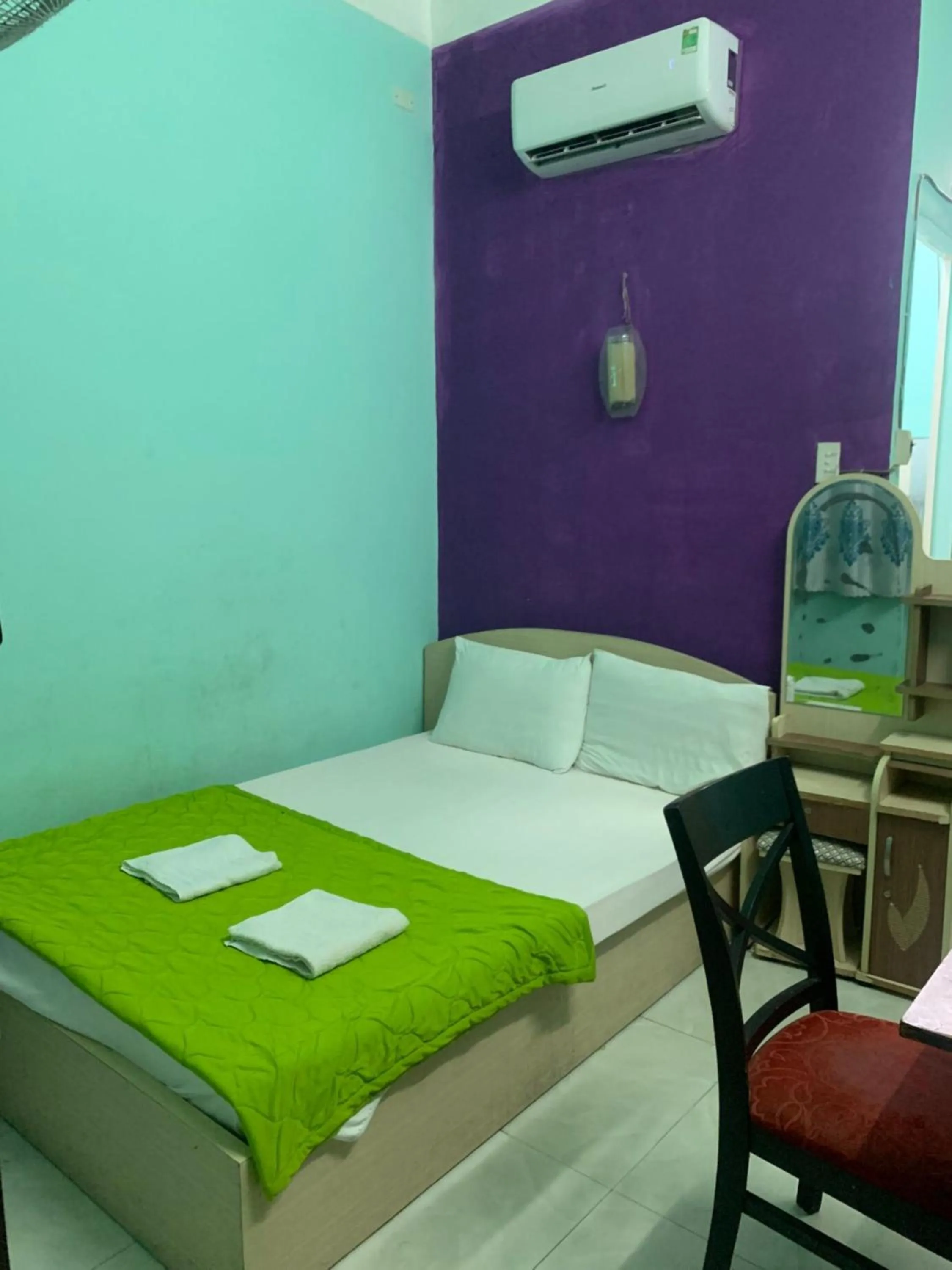 Photo of the whole room in Happy Hotel Binh Tan