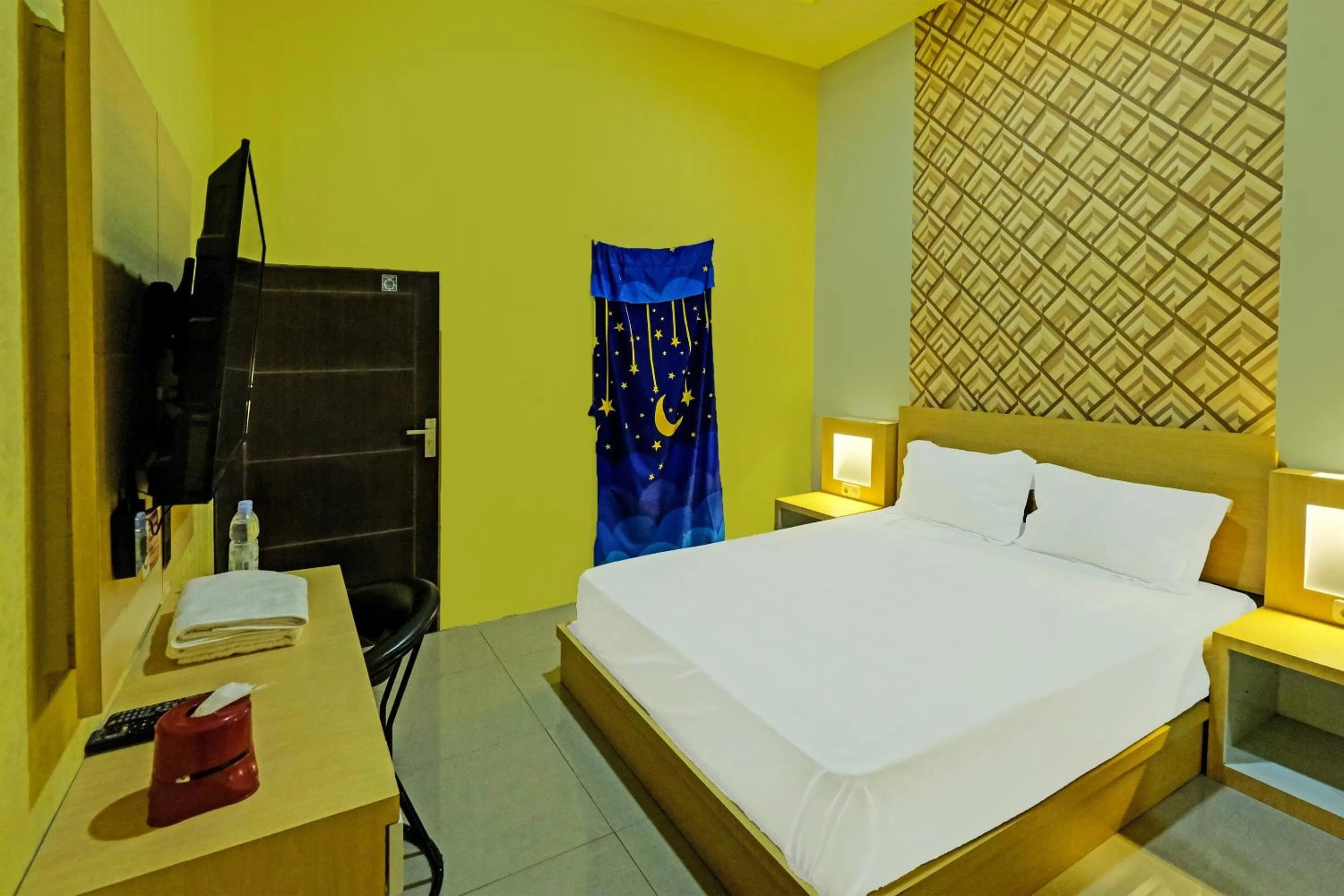 Bedroom in Hotel O Callista Homestay Near RSUD Prof. Dr. H. M. Anwar Makkatutu