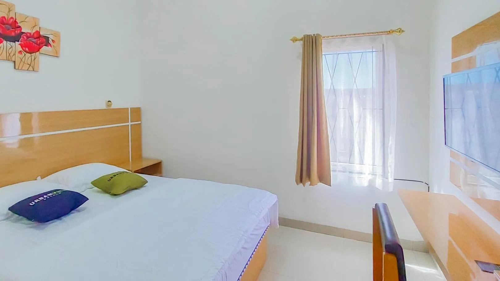 Bed in Urbanview Hotel Bundaran Besar Palangkaraya by RedDoorz