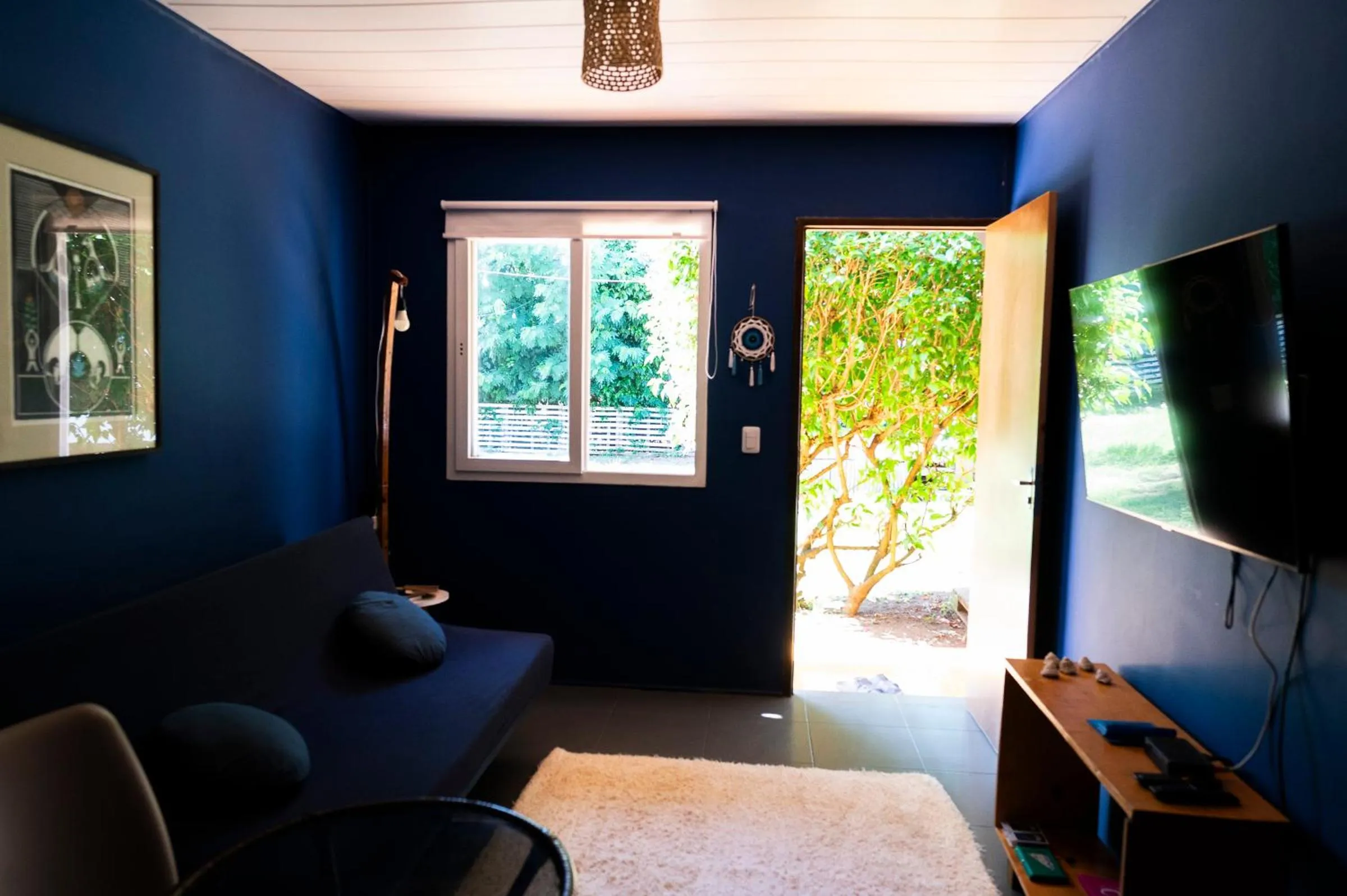 Communal lounge/ TV room in Pousada Estrela Cordel