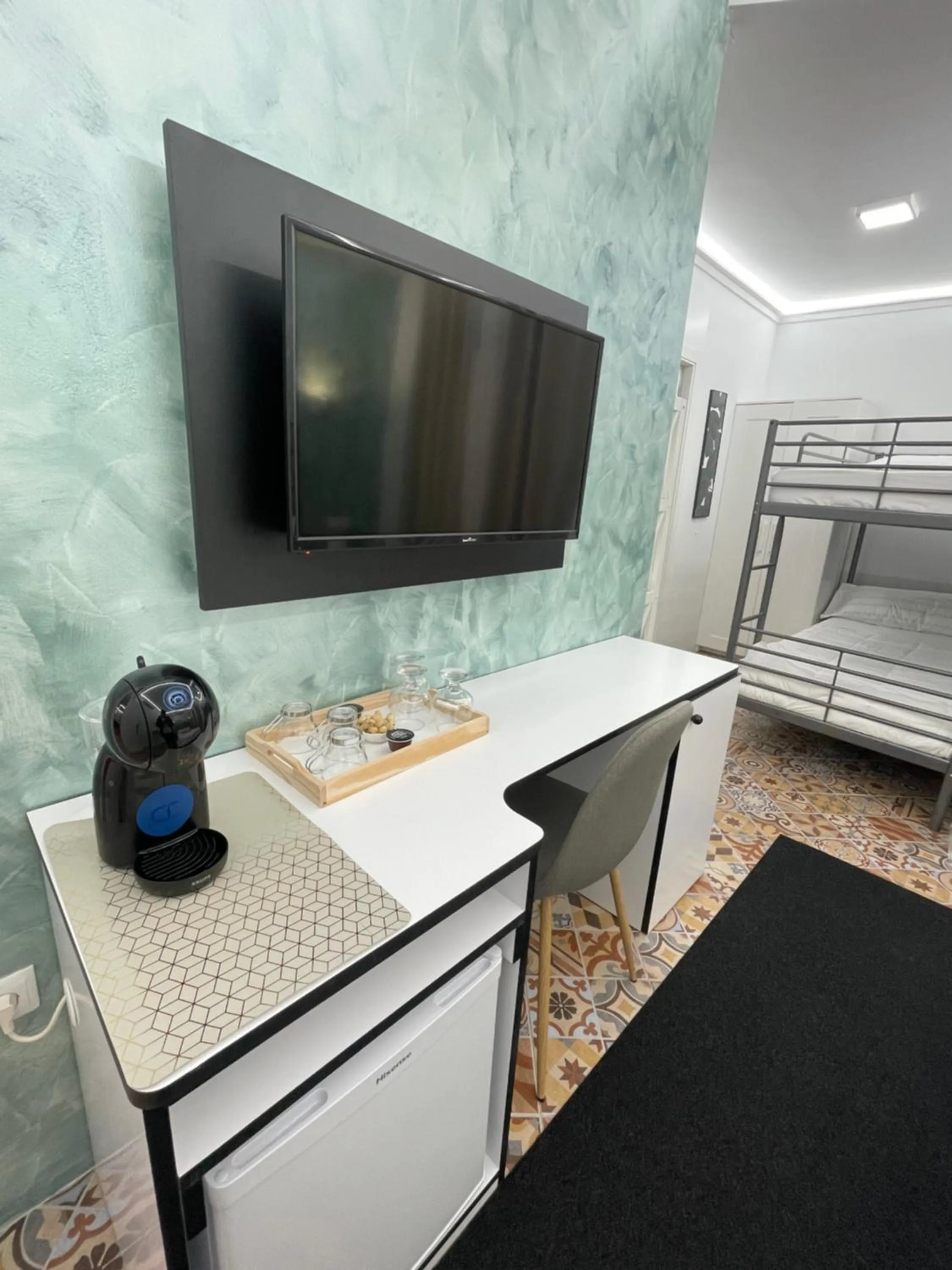 Communal lounge/ TV room in Galeon Boutique Hotel