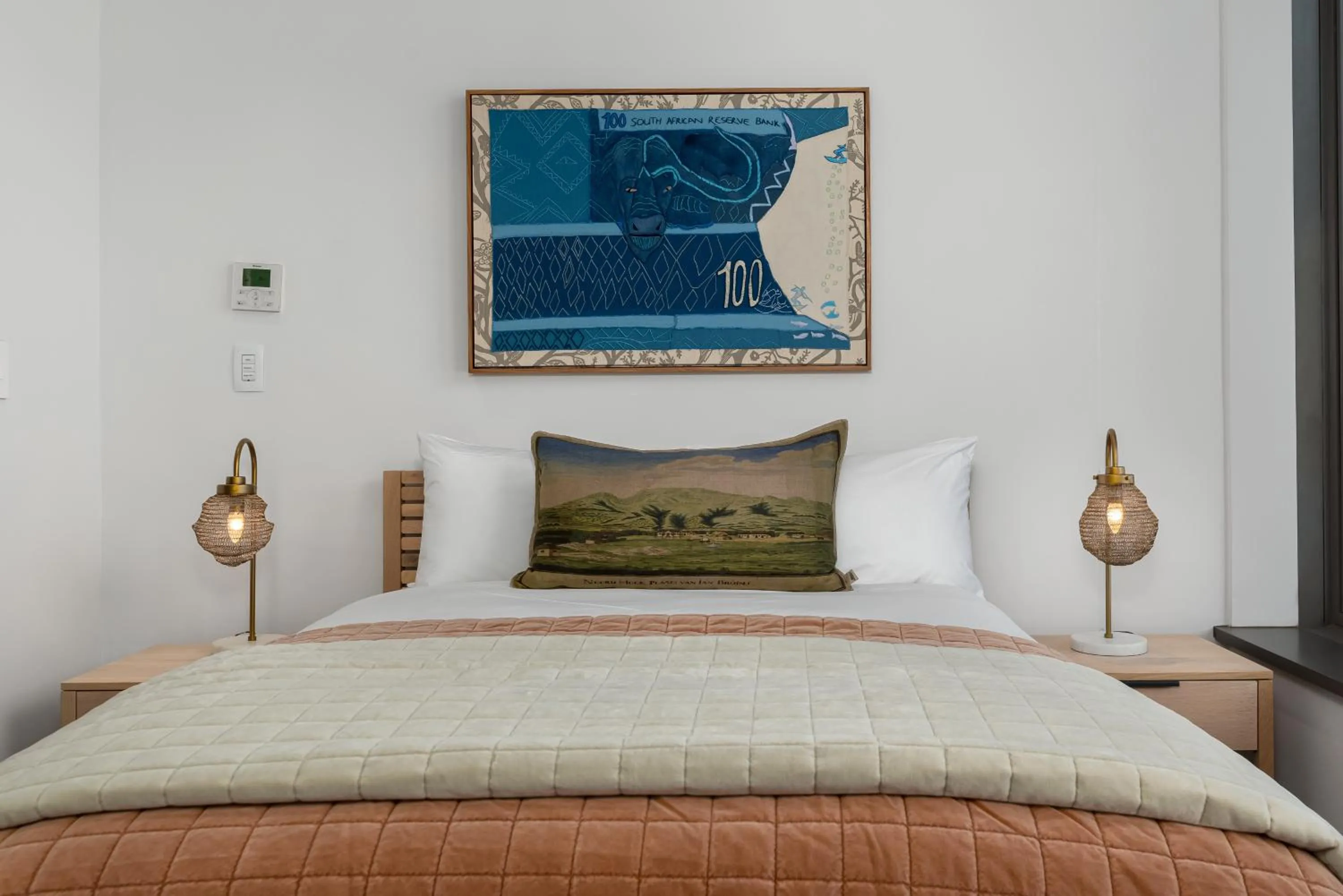 Bed in 117 on Strand Luxury Apartments