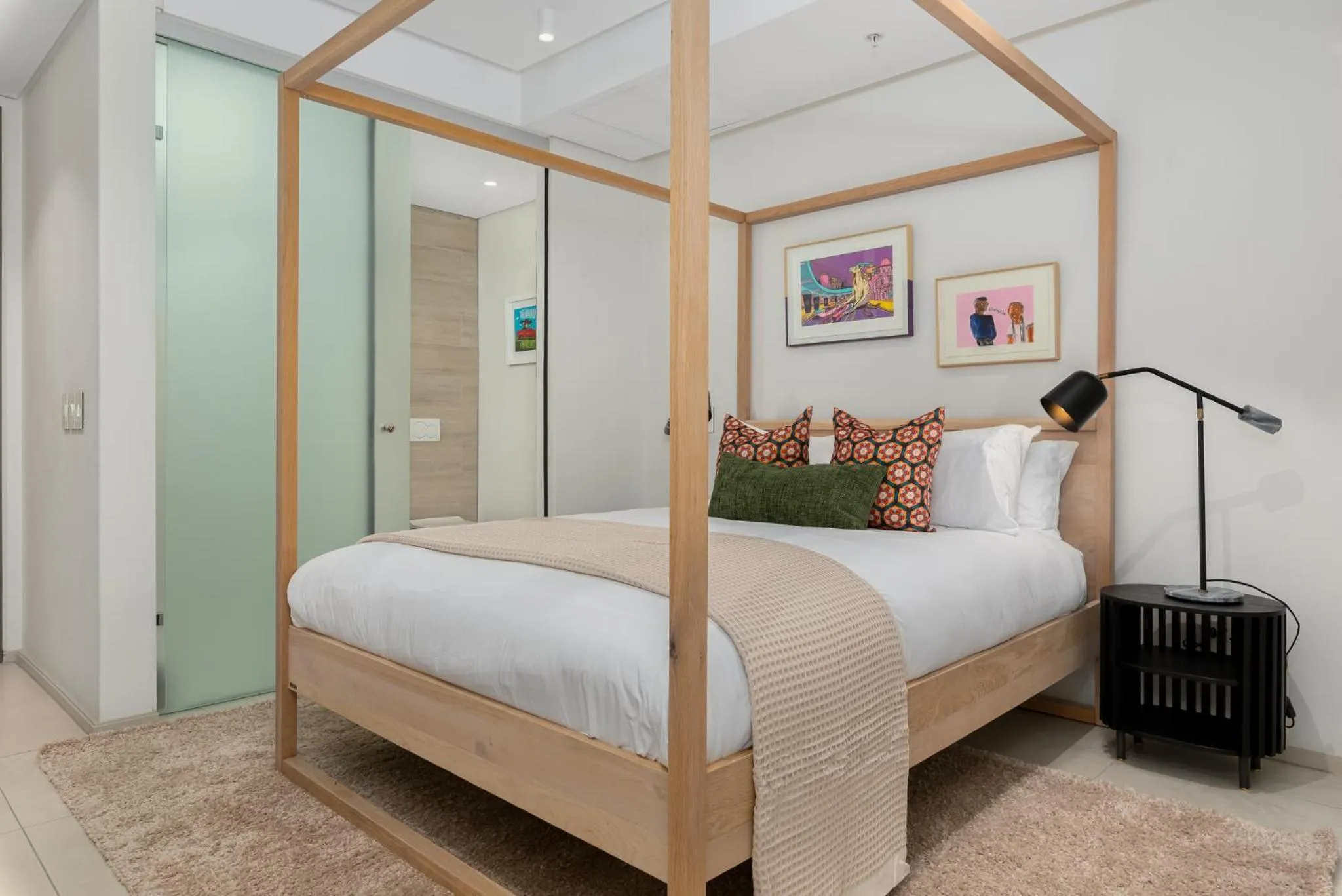 Bed in 117 on Strand Luxury Apartments