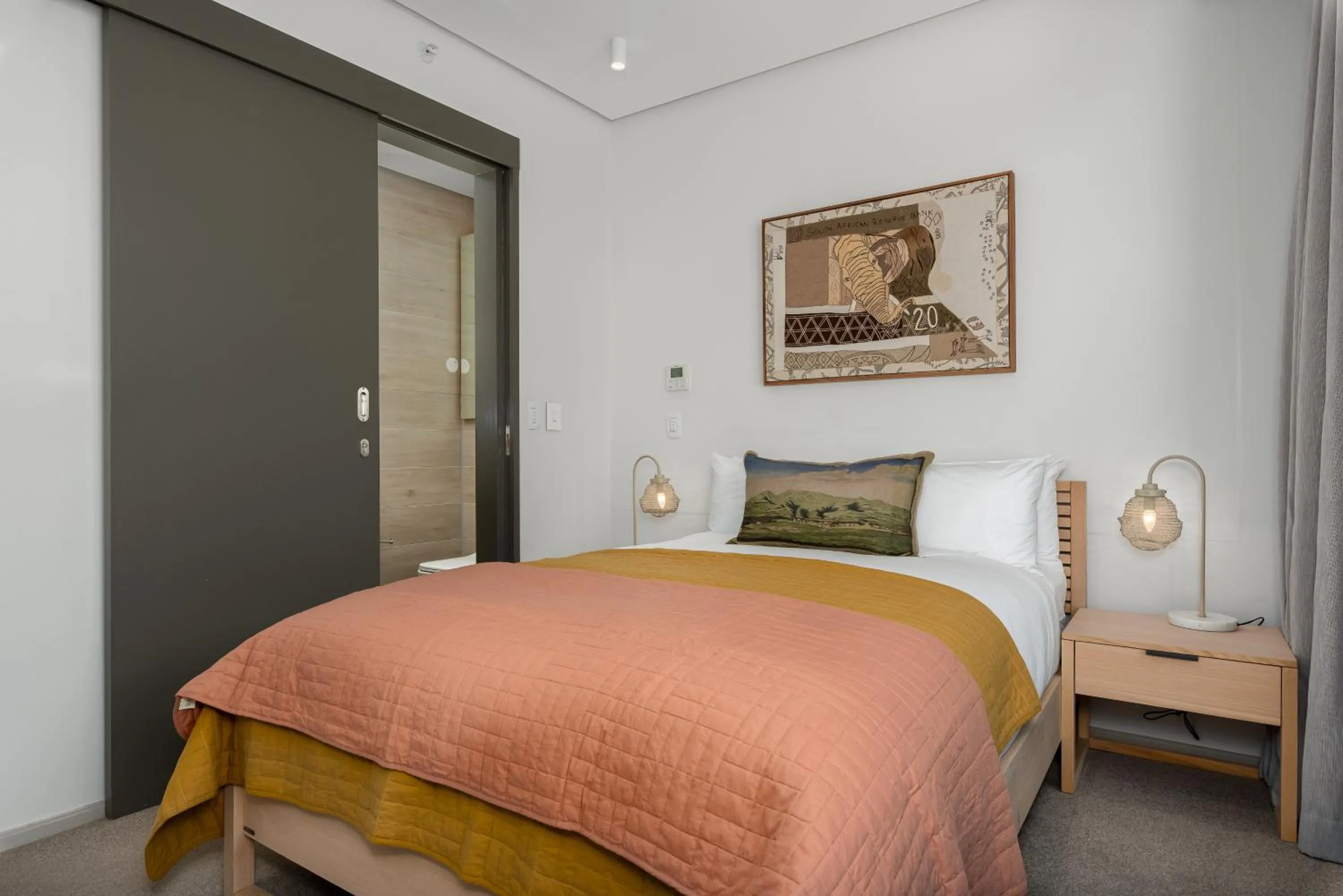Bed in 117 on Strand Luxury Apartments