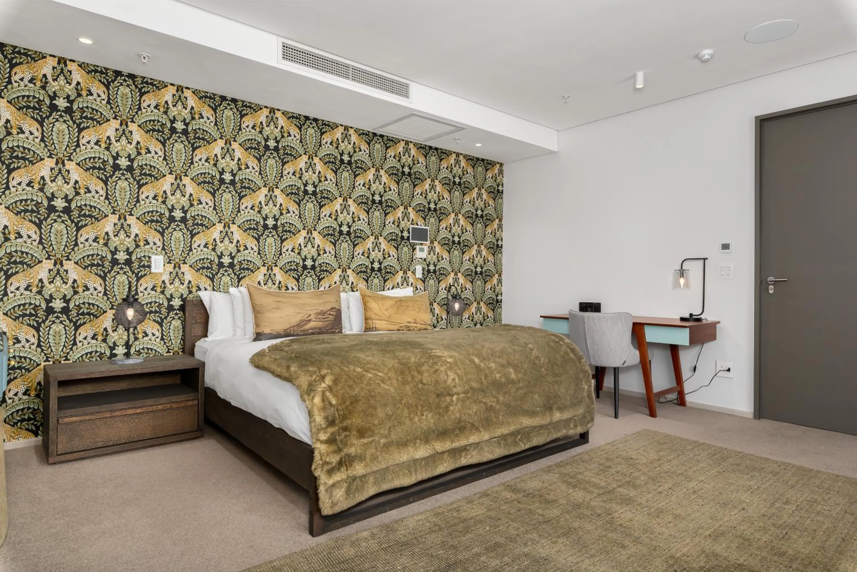 Bed in 117 on Strand Luxury Apartments