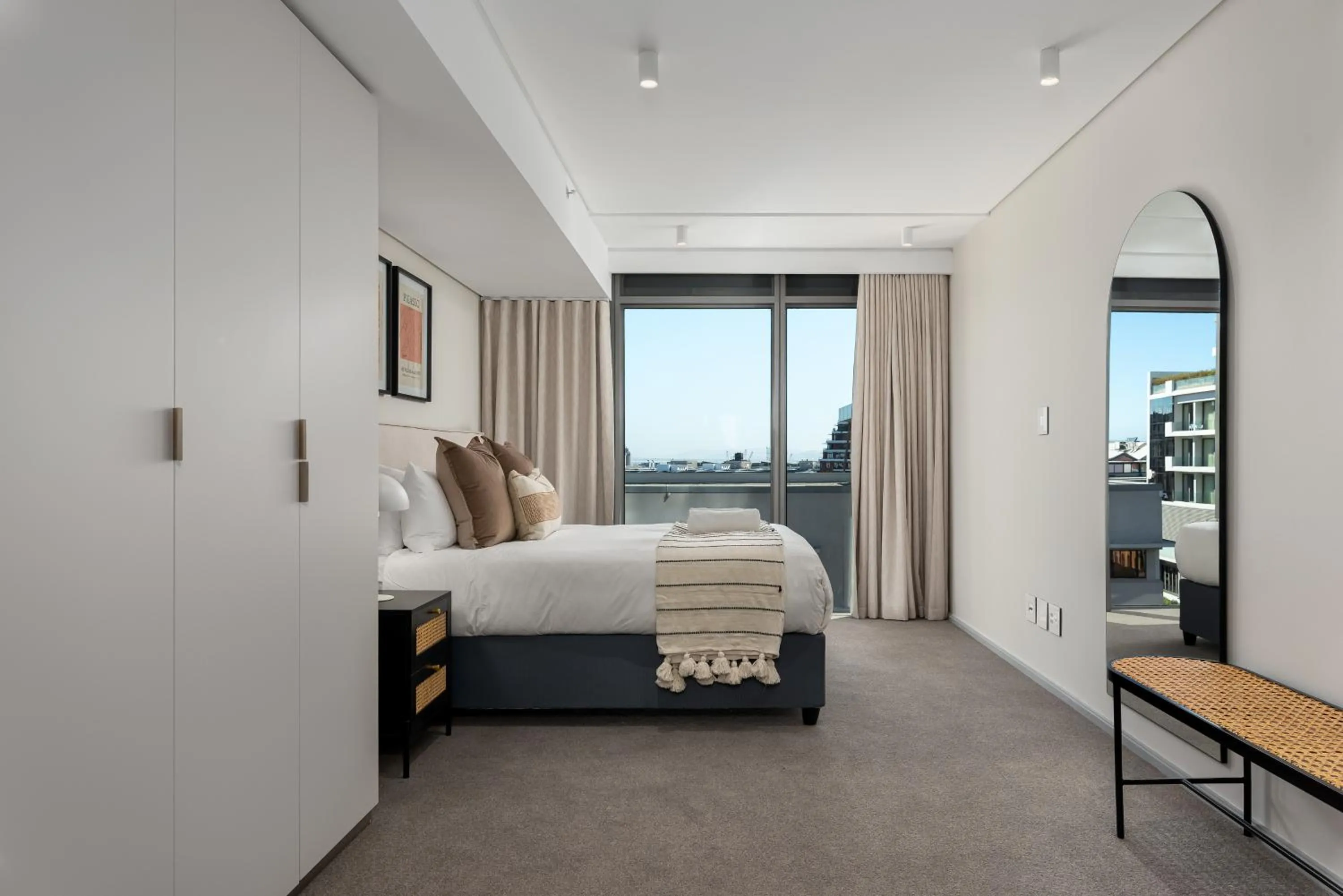 Bed in 117 on Strand Luxury Apartments