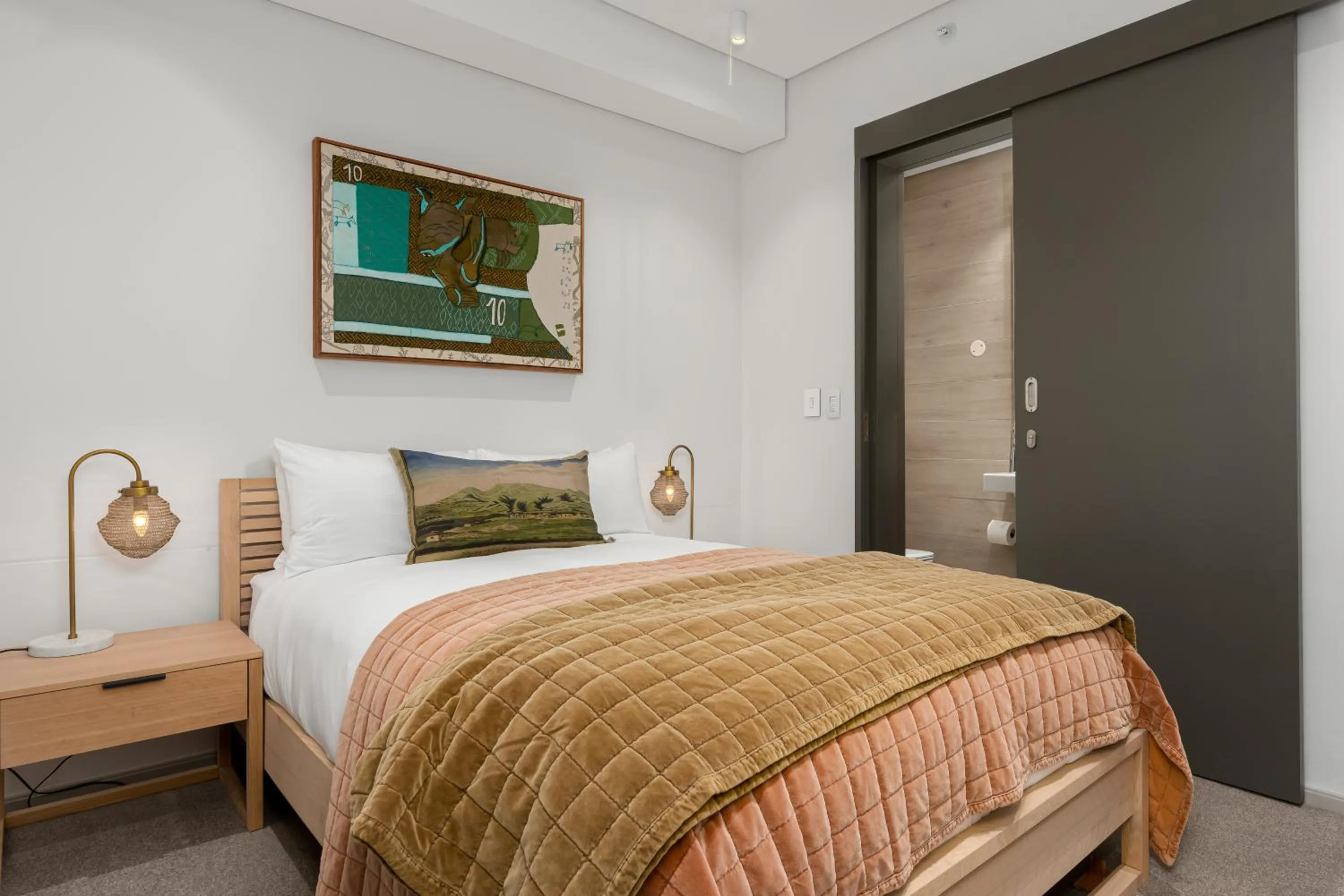 Bed in 117 on Strand Luxury Apartments