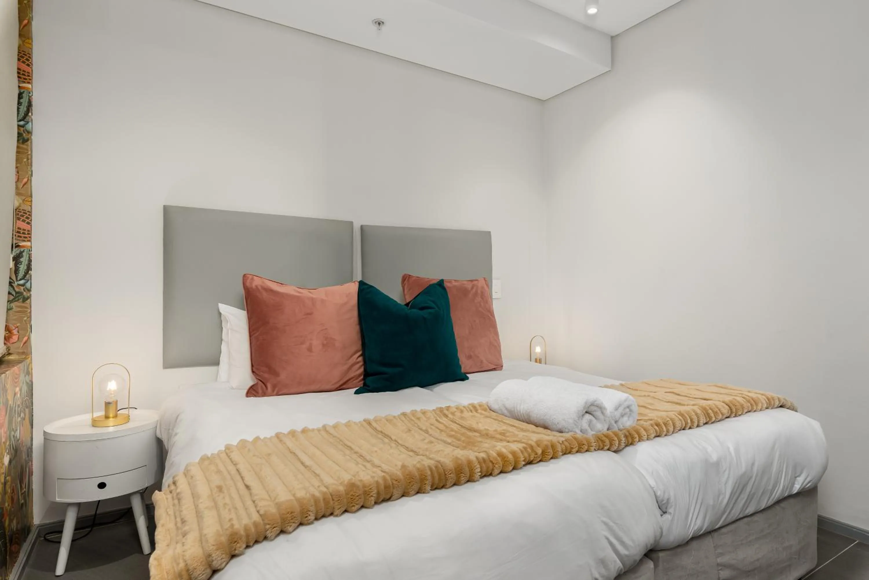 Bed in 117 on Strand Luxury Apartments