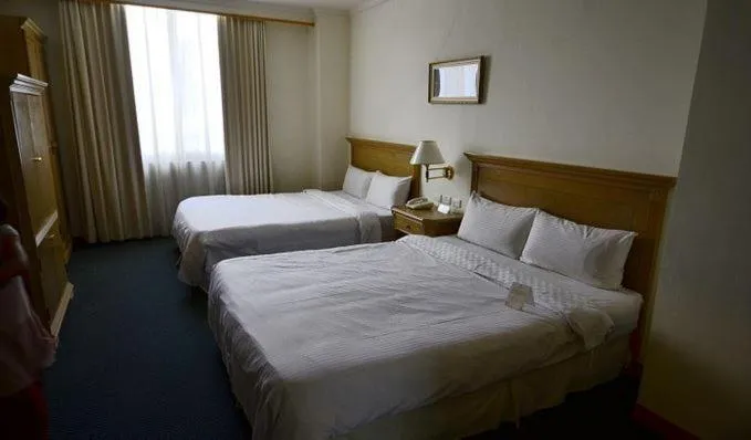 Bed in Cambridge Hotel - Yung Kang