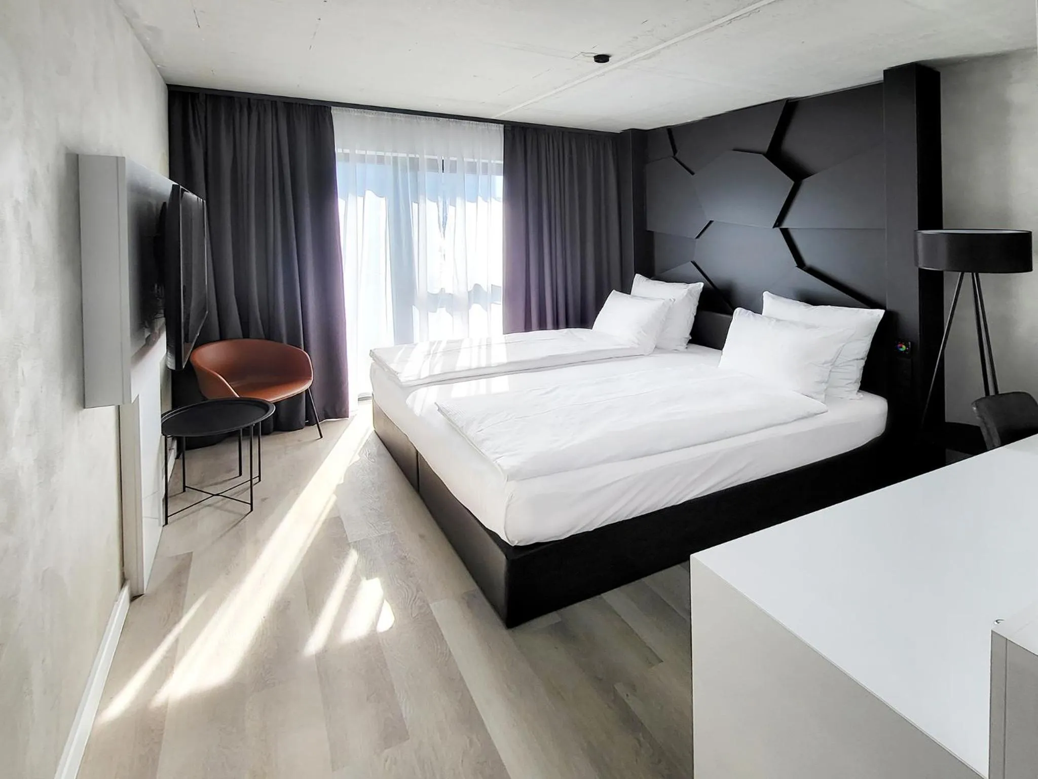 Photo of the whole room, Bed in DORMERO Hotel Aschaffenburg