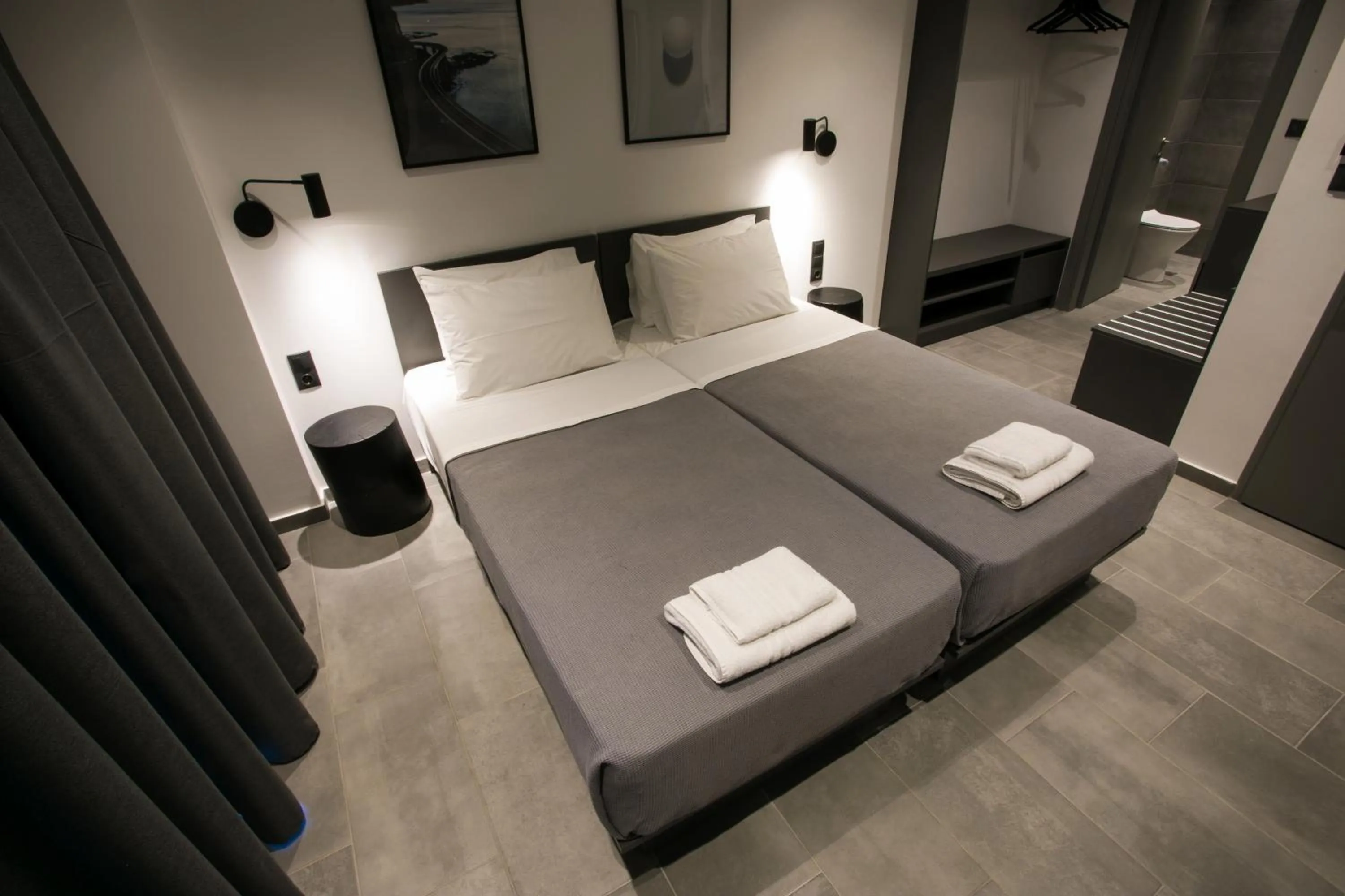 Photo of the whole room, Bed in White Trilogy