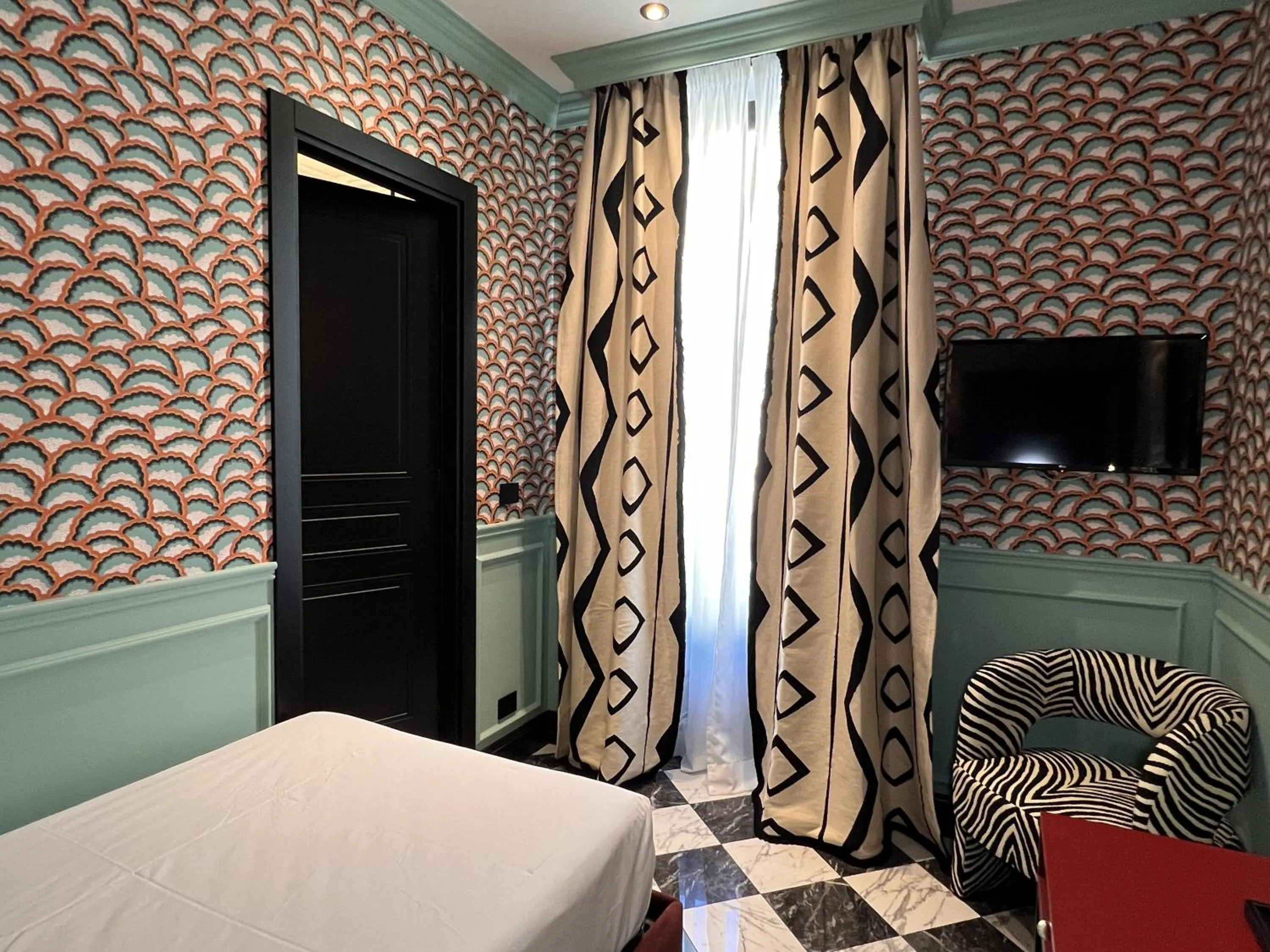 Decorative detail, Bed in Demidoff Hotel Milano