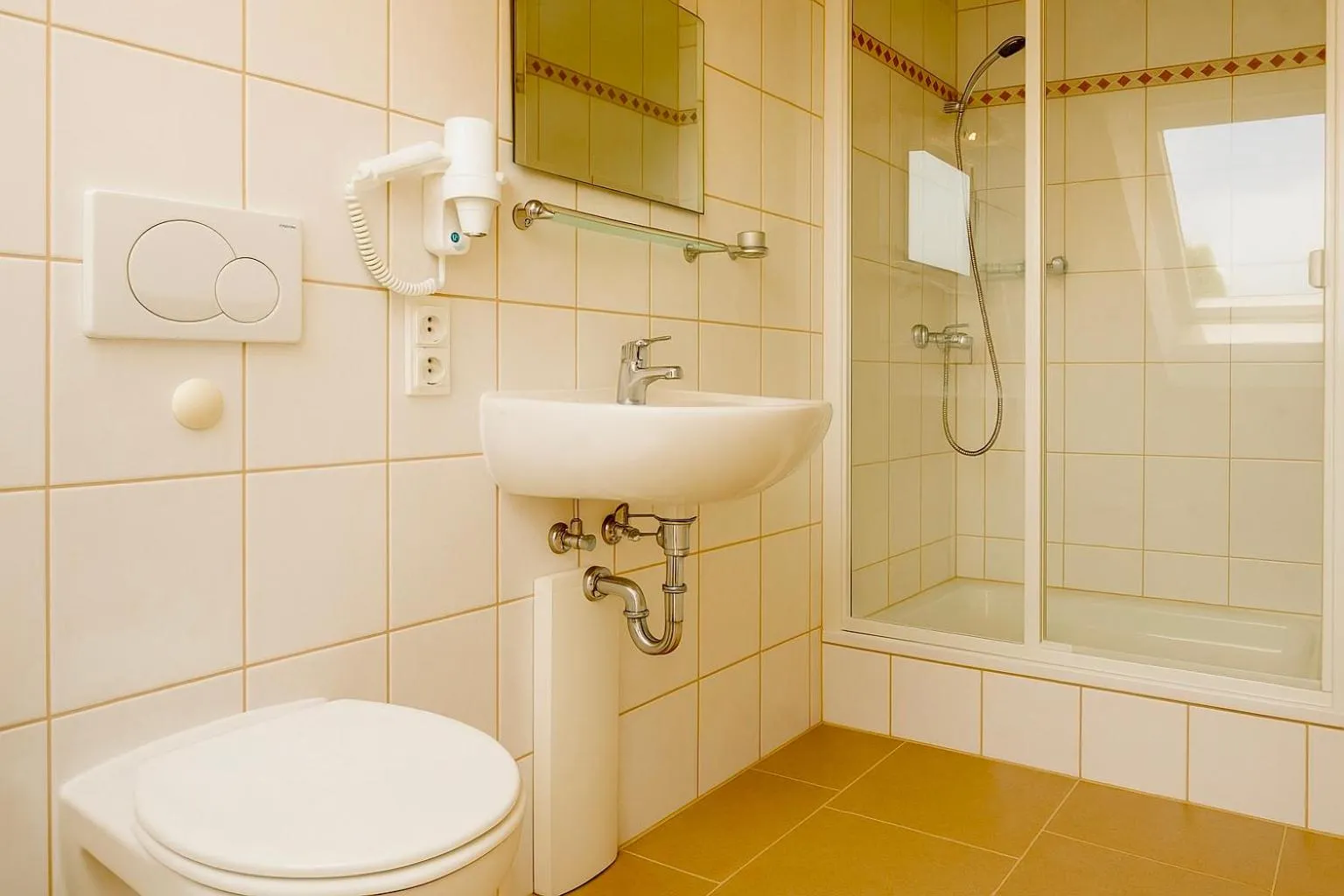 Shower in Nanis Hotel & Appartements