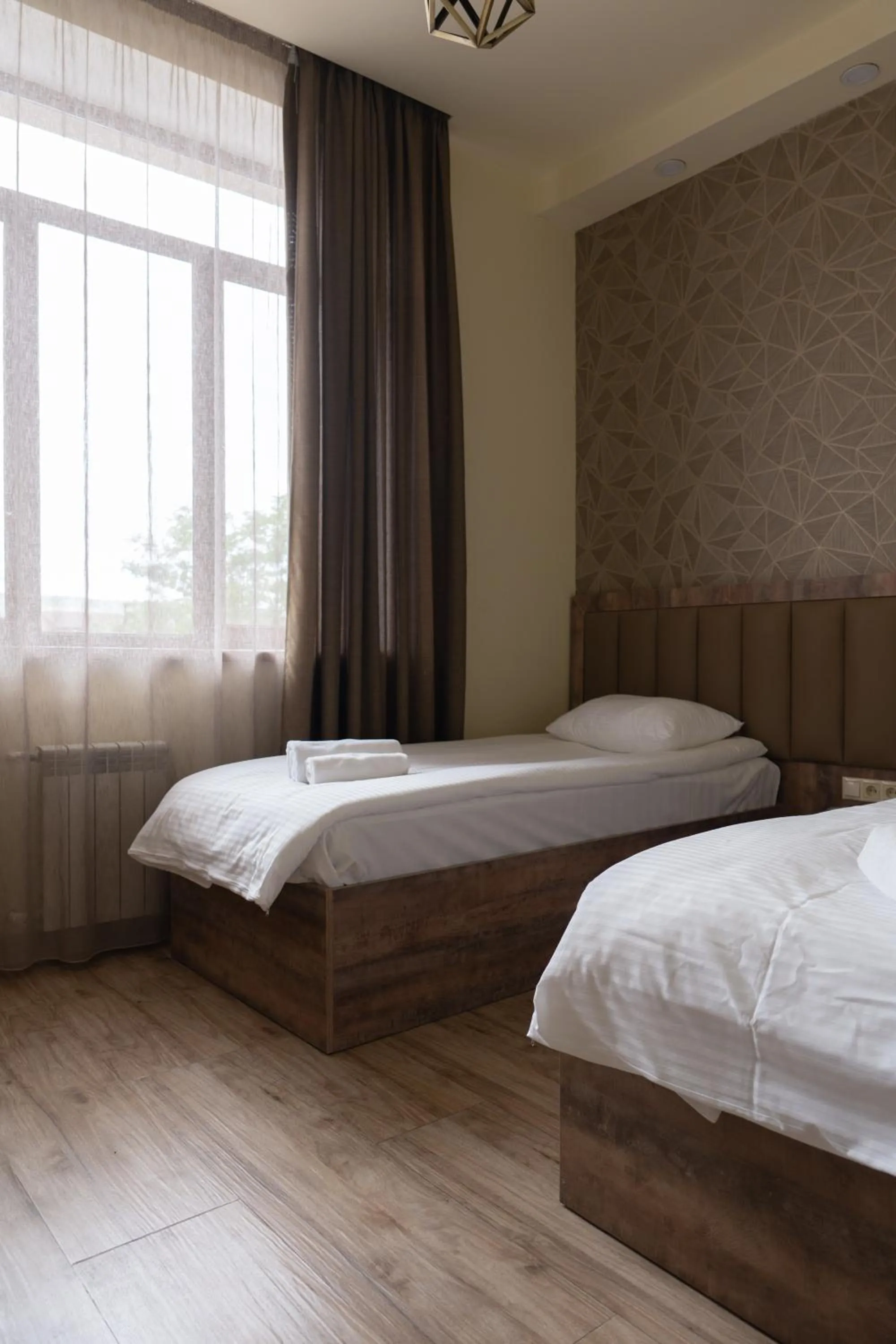 Bed in Glendale Boutique Hotel