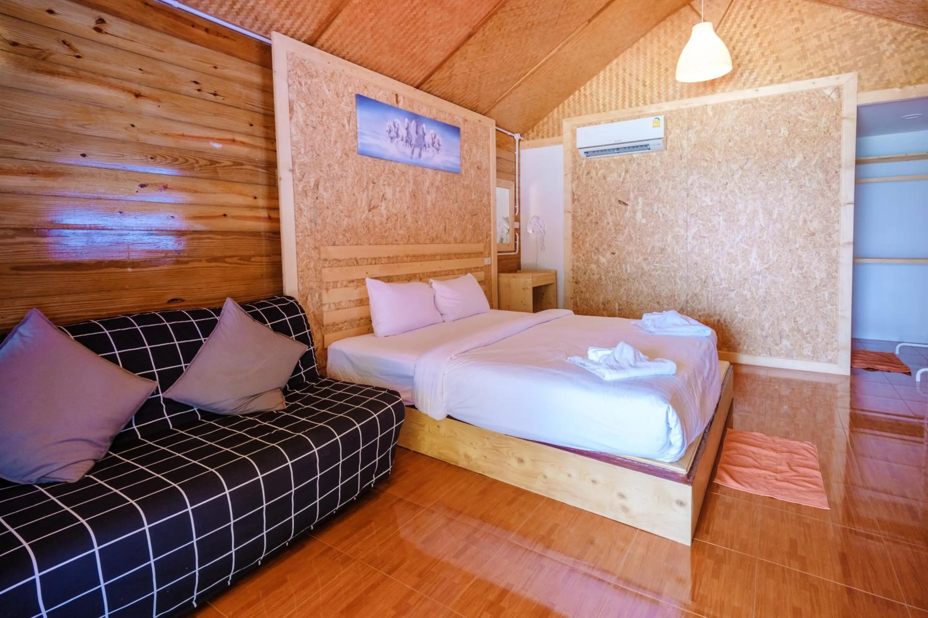 Bed in Lipe Garden Beach Resort