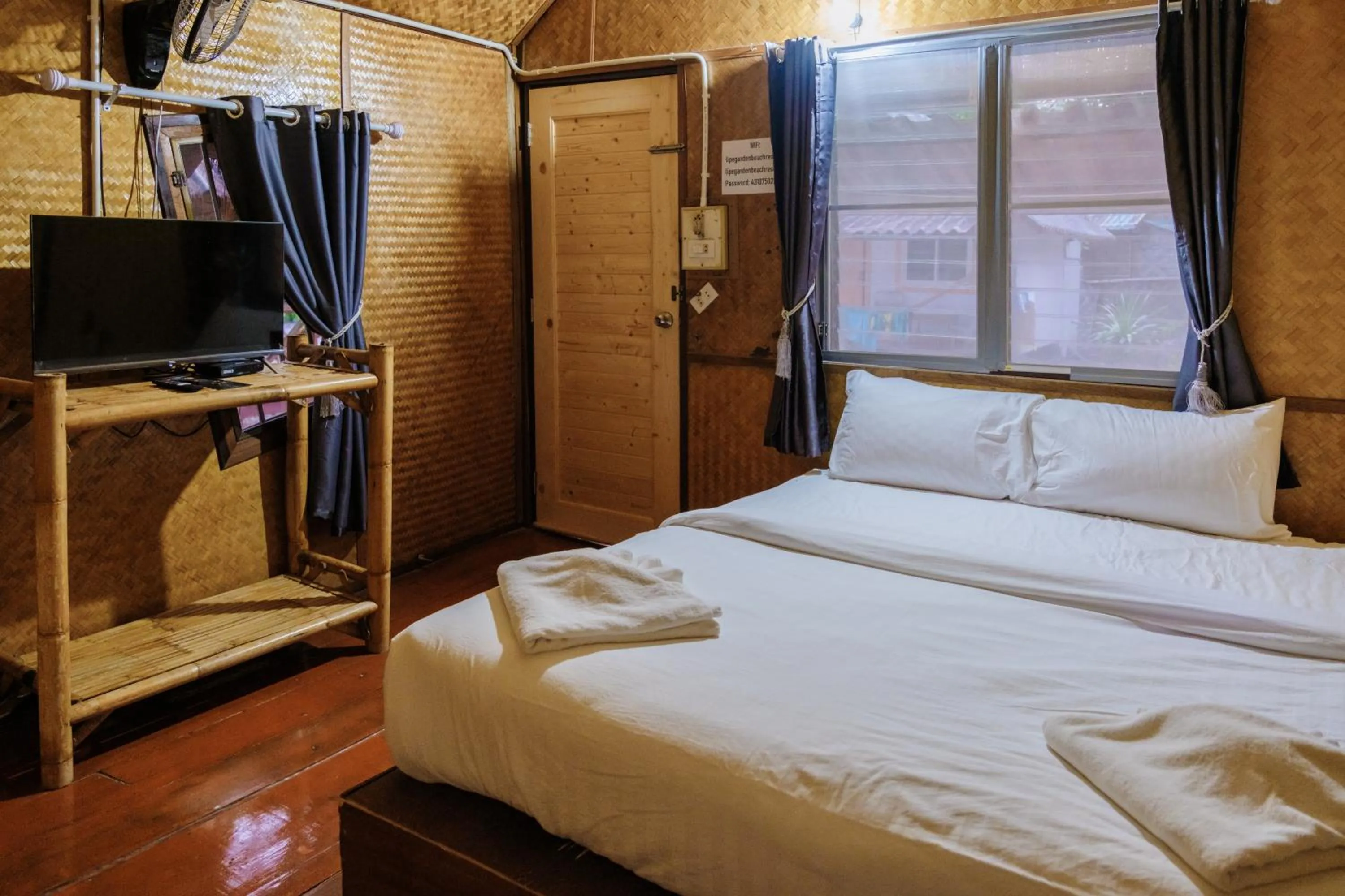 Bed in Lipe Garden Beach Resort