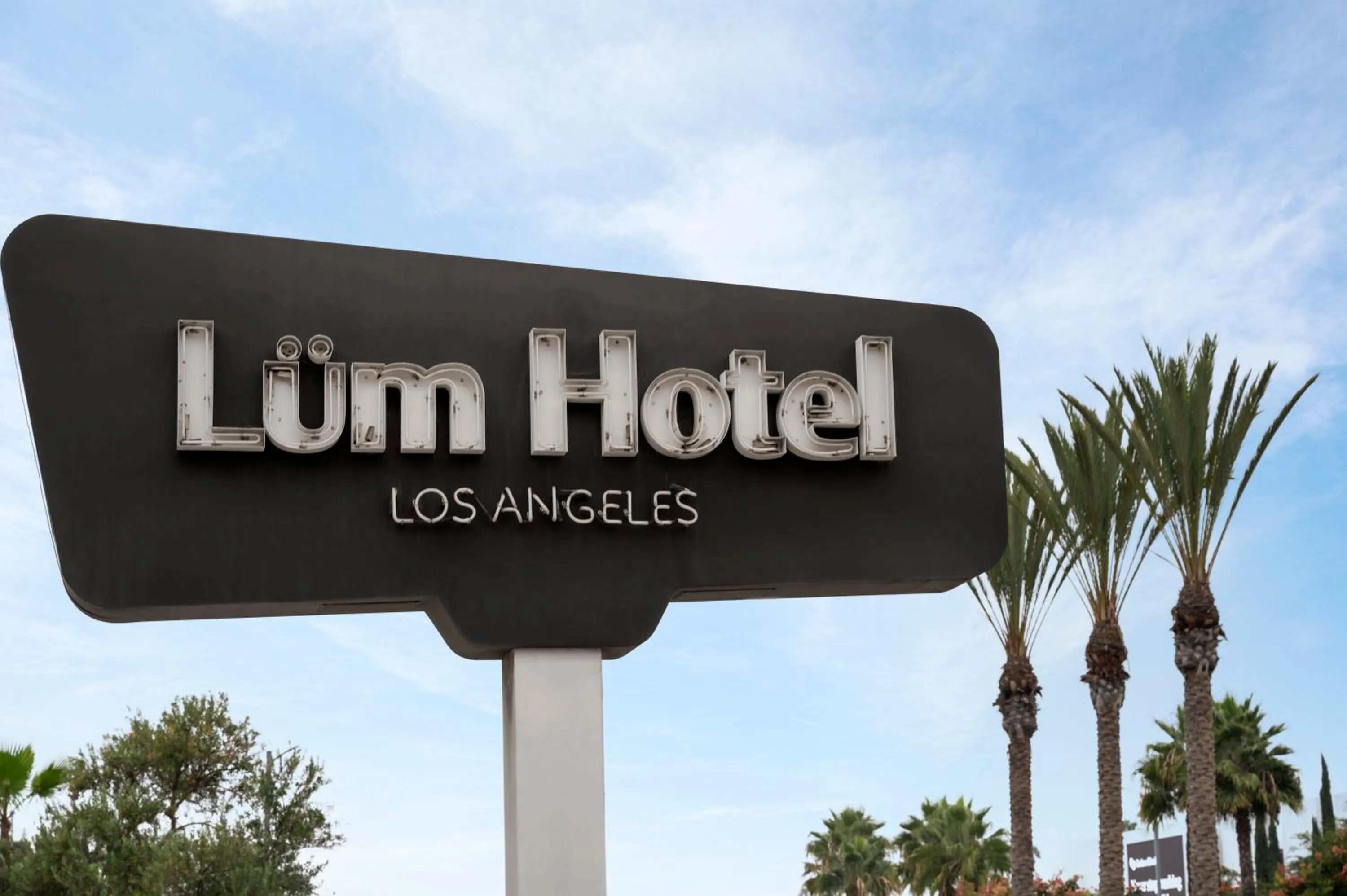Property logo or sign in The Lum Hotel Los Angeles Stadium District