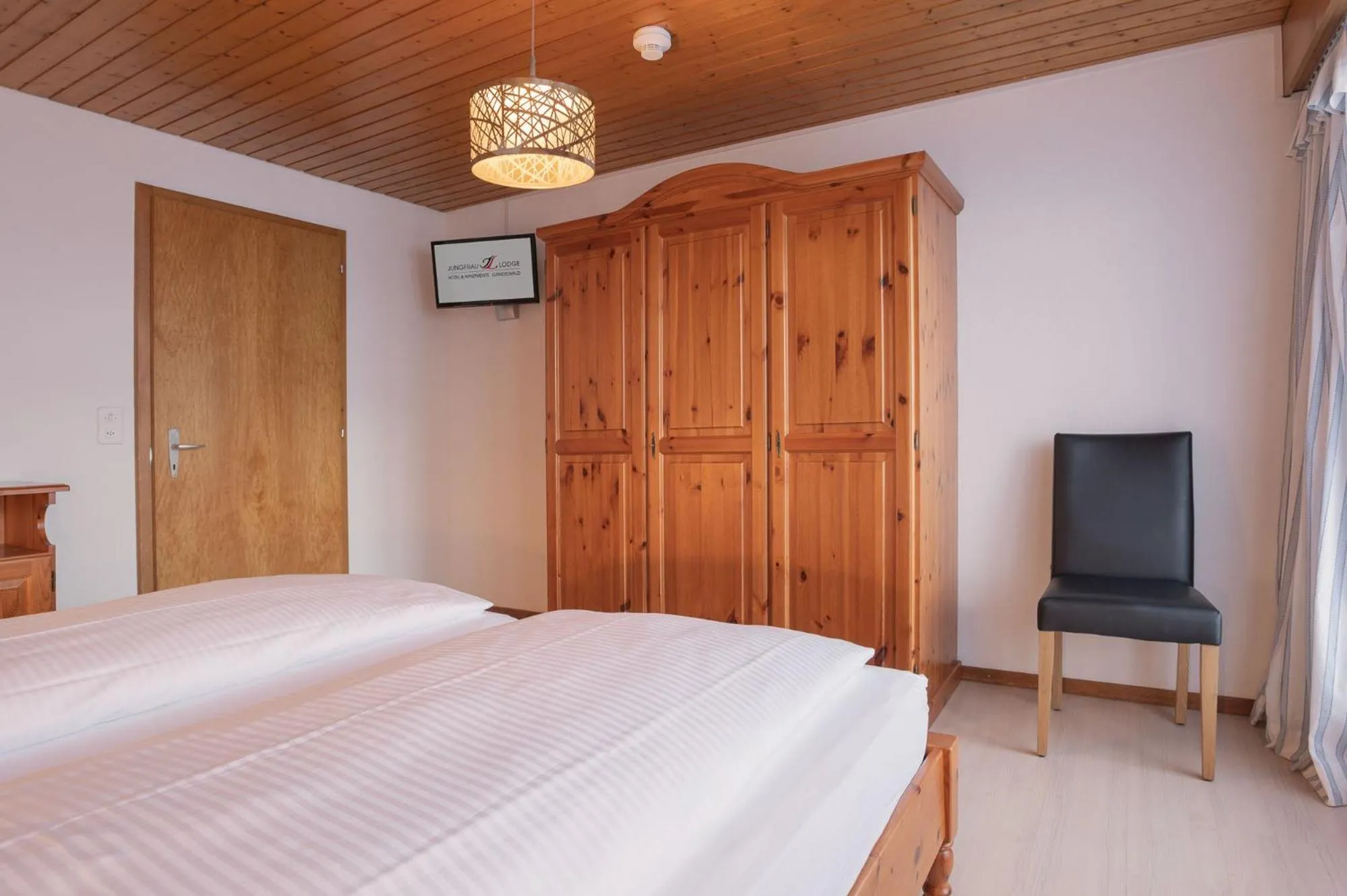 Bedroom, Bed in Apartment Jungfrau Lodge