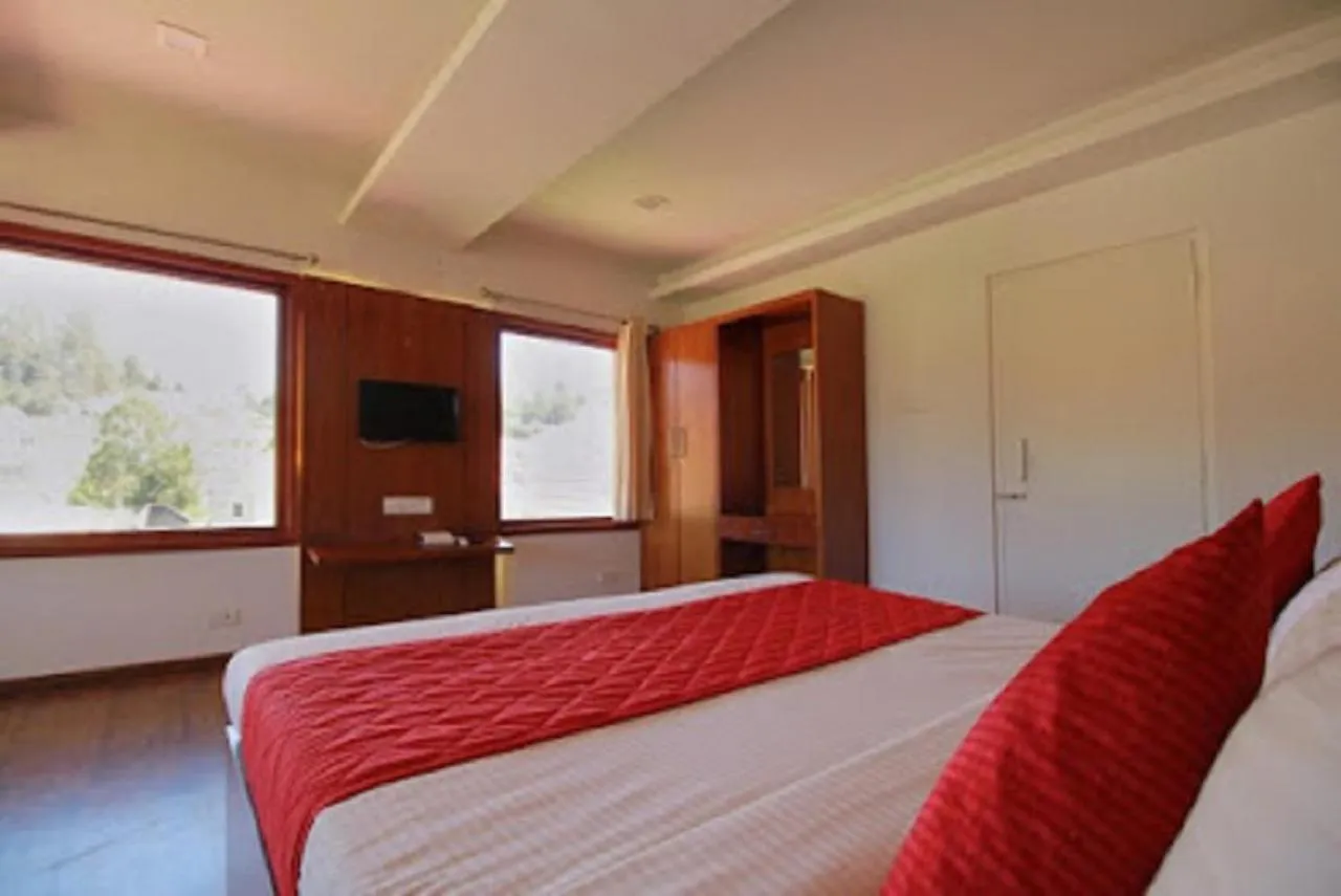 Bed in Coastal Grand Resort - Ooty