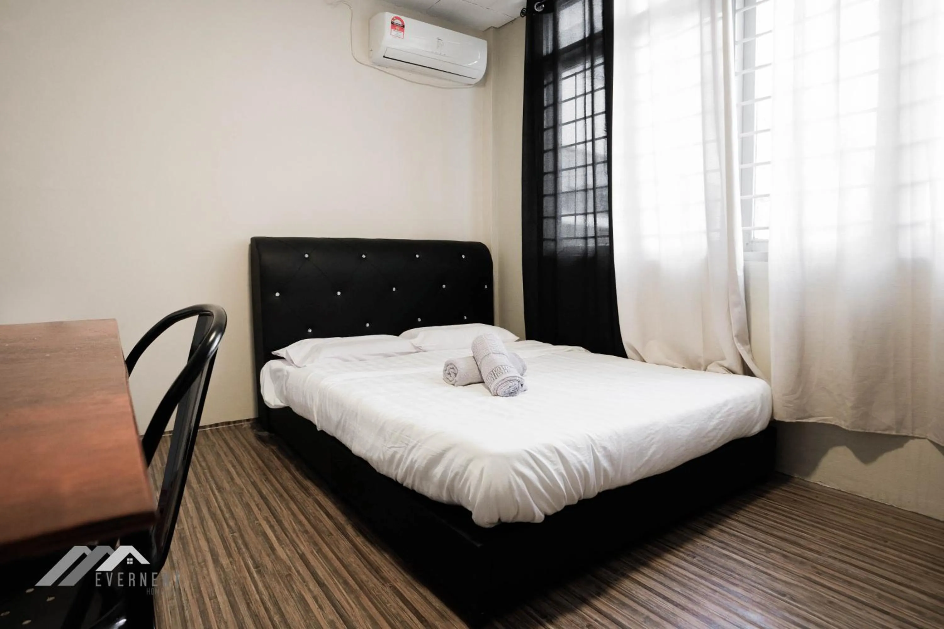 Bed in Permaisuri Homestay by Evernent