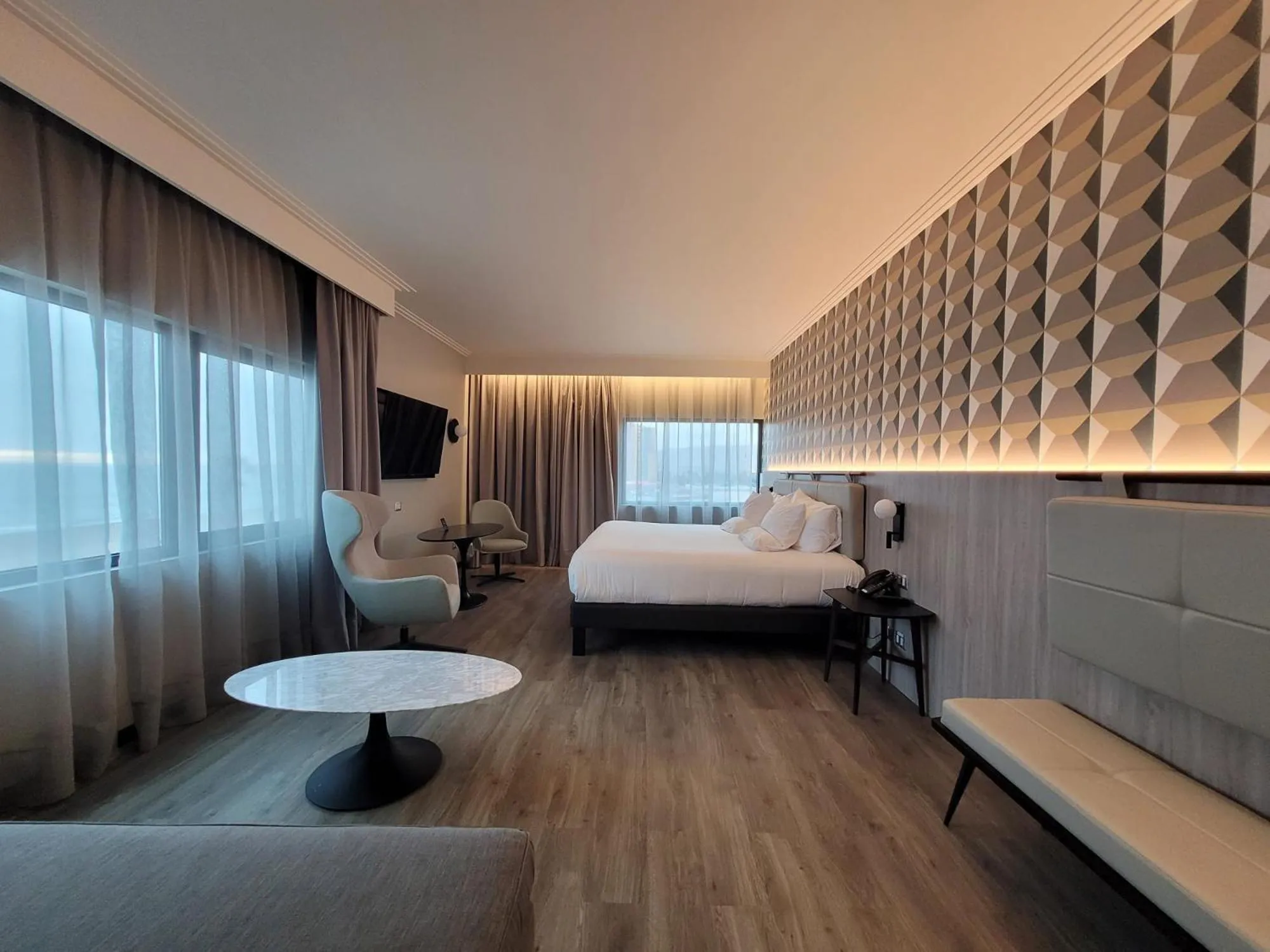 Photo of the whole room, Bed in Novotel Arica