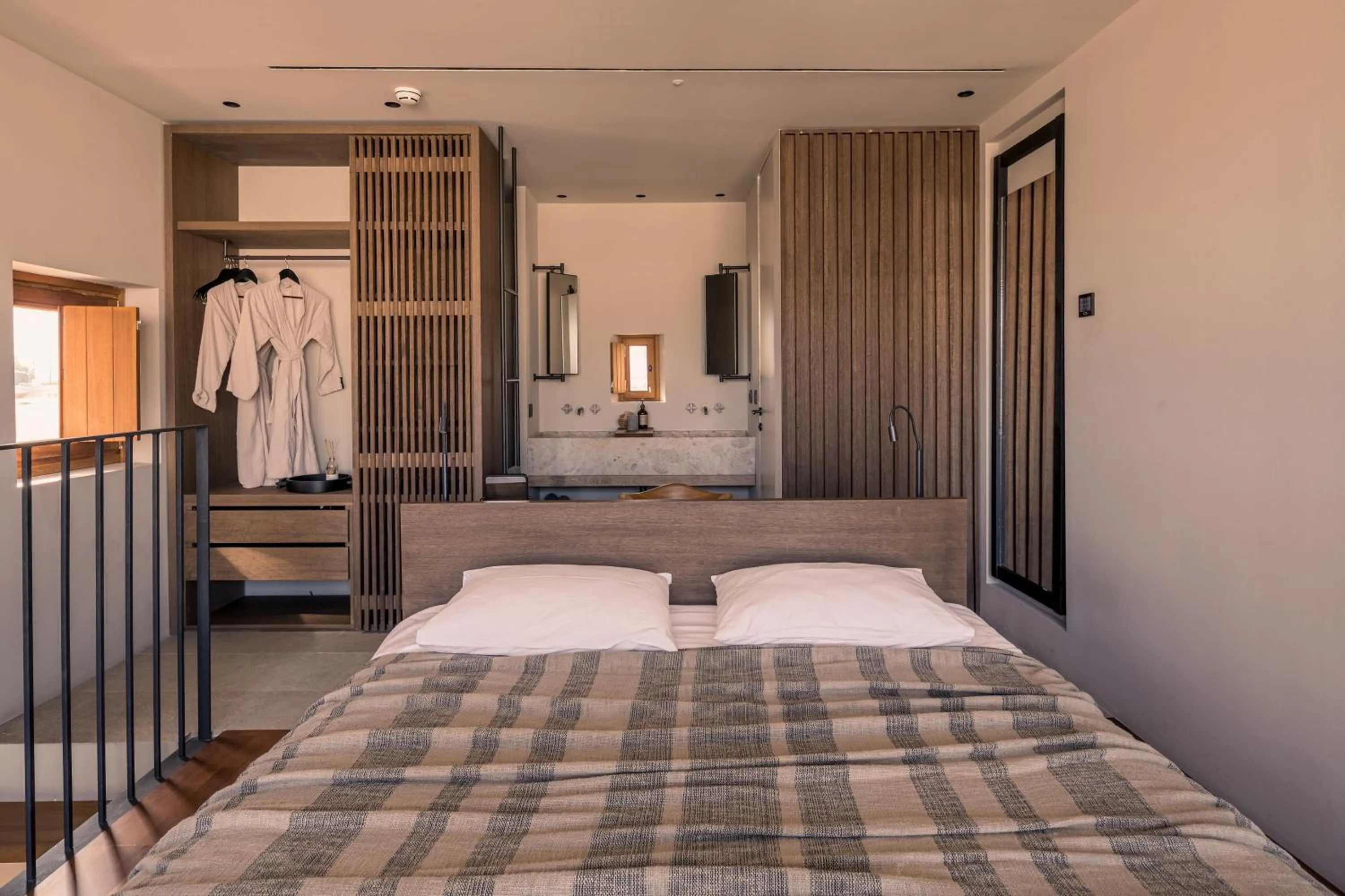 Bed in Theros All Suite Hotel - Adults Only