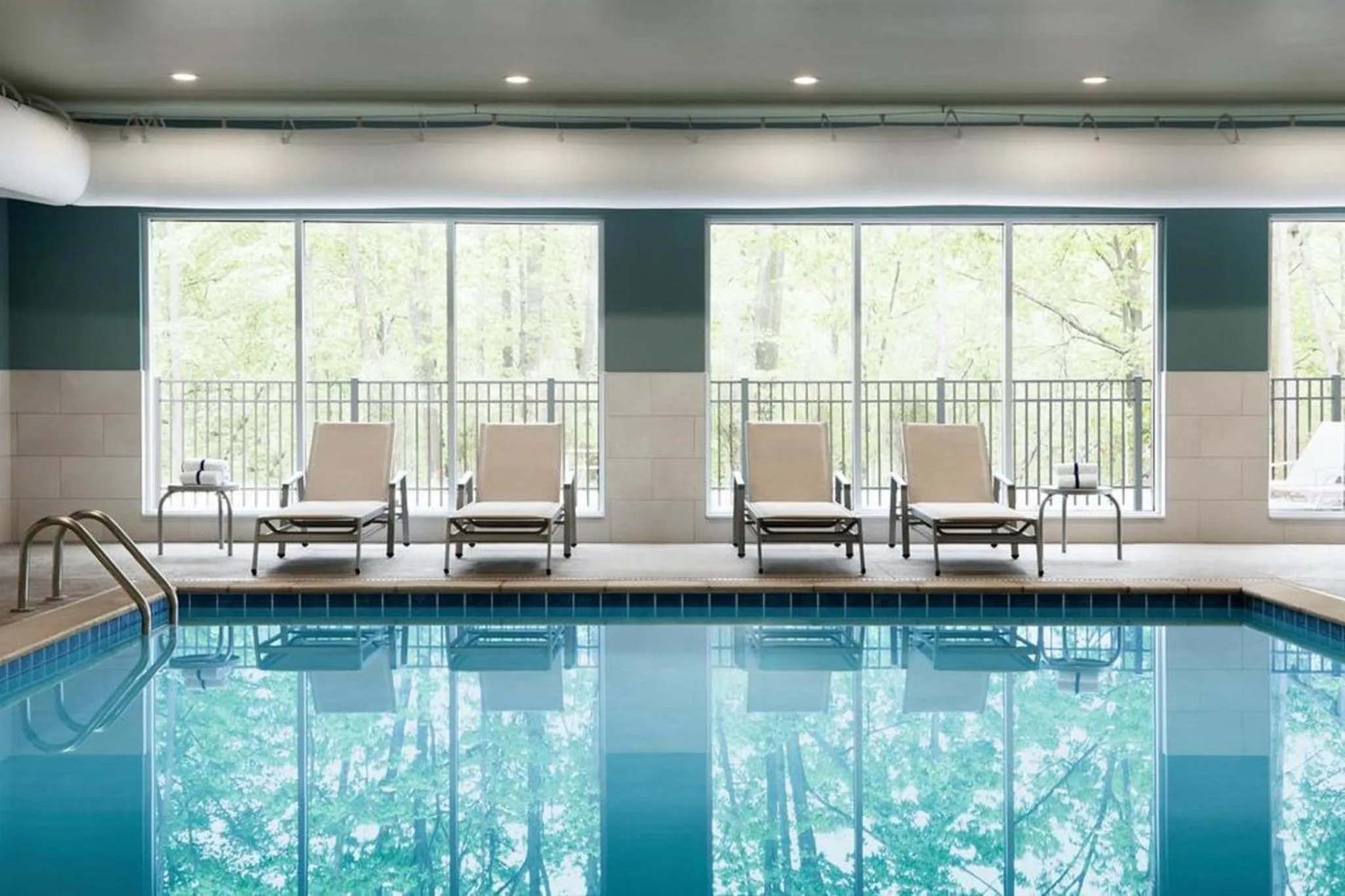 Swimming pool in Holiday Inn Express & Suites - Jacksonville-Camp LeJeune Area by IHG