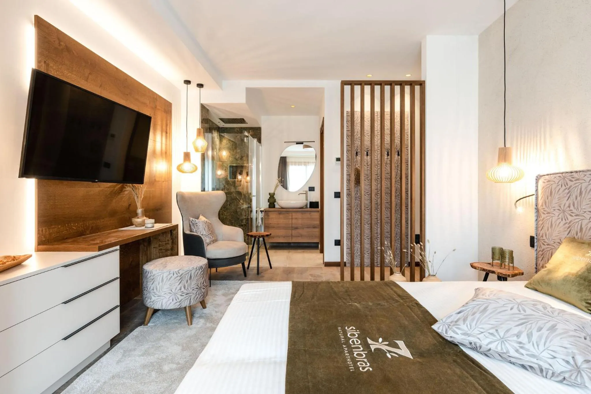 Bed in Sibenbras Natural Aparthotel