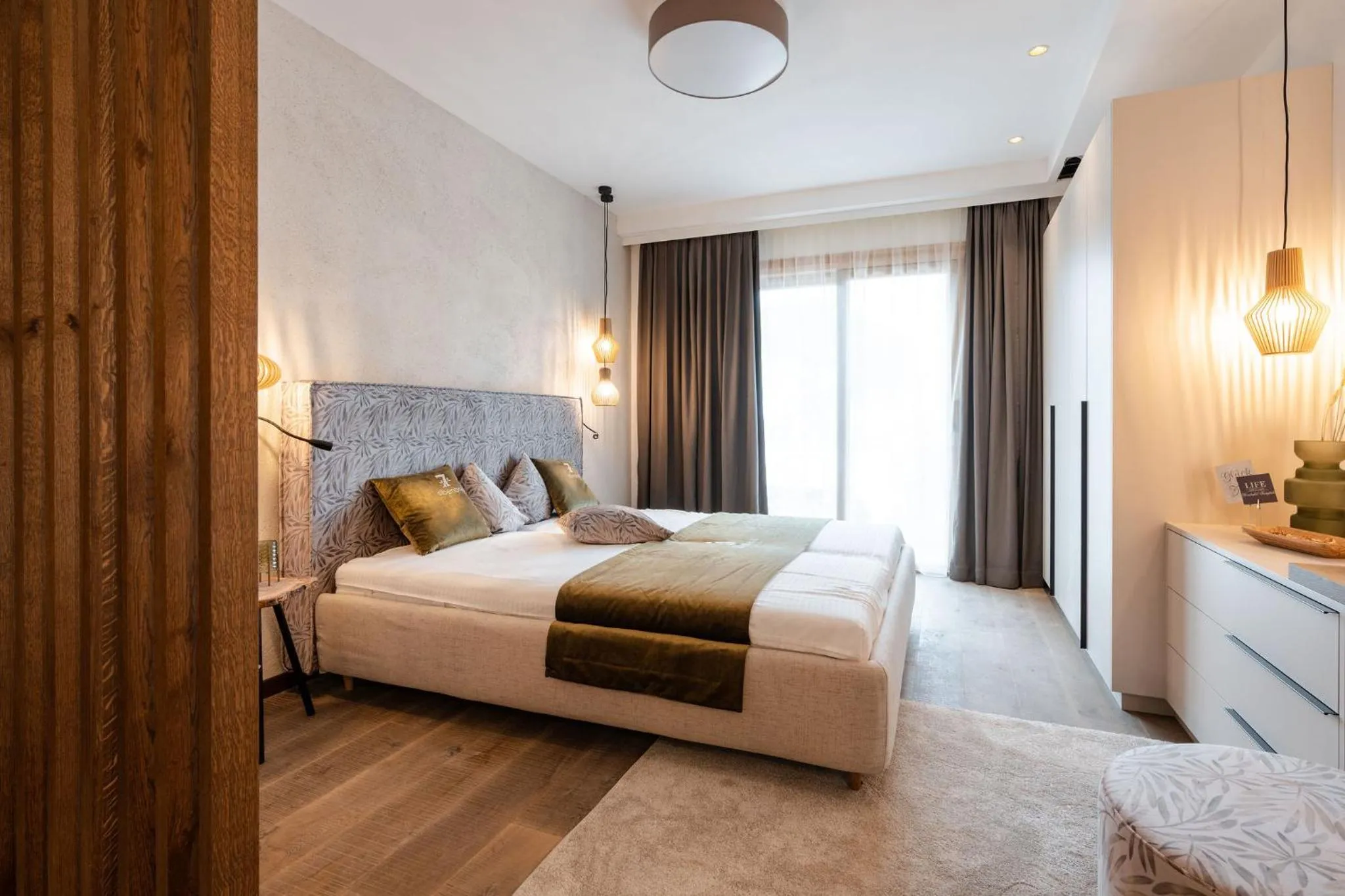 Bed in Sibenbras Natural Aparthotel