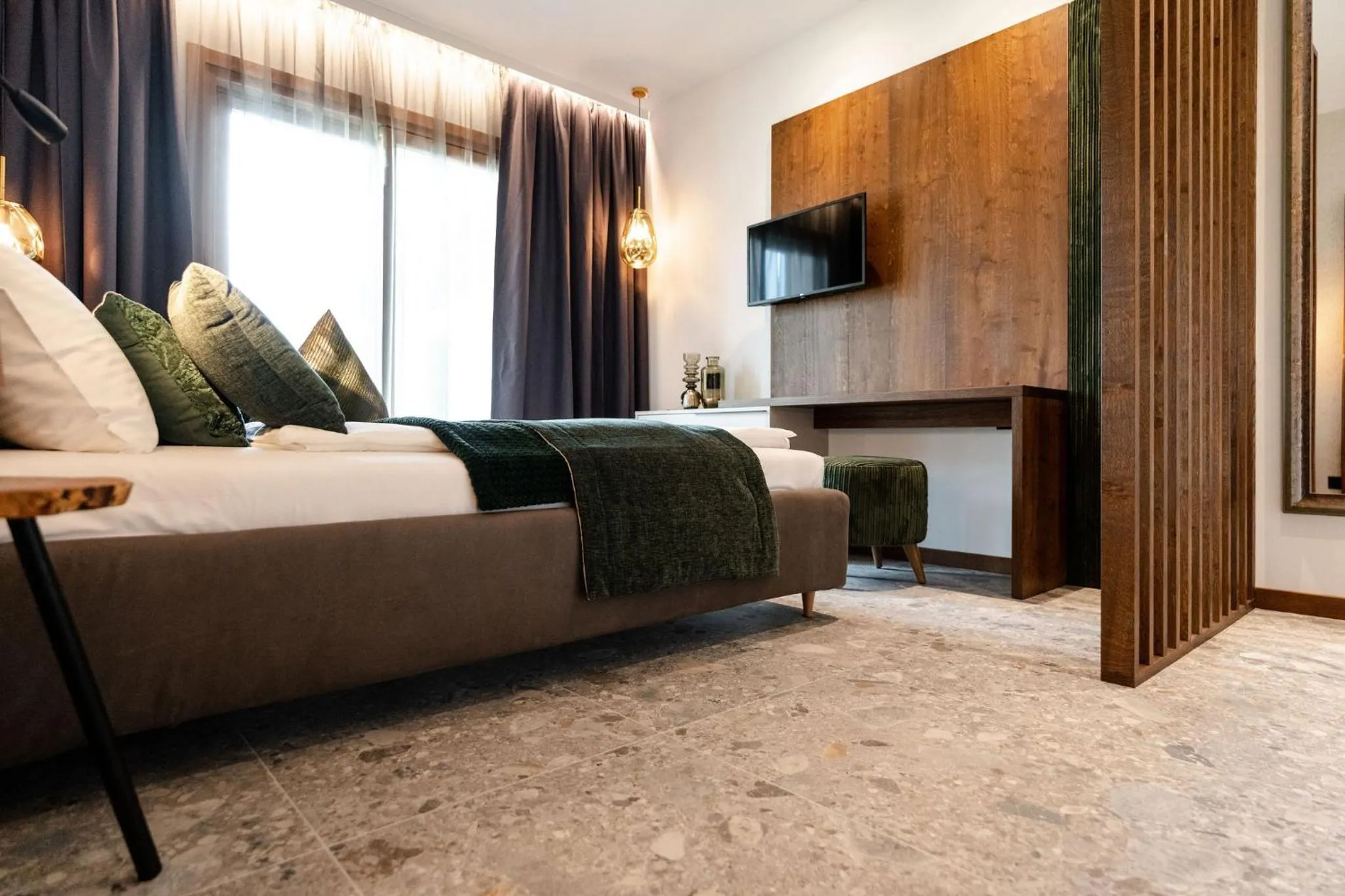 Bed in Sibenbras Natural Aparthotel