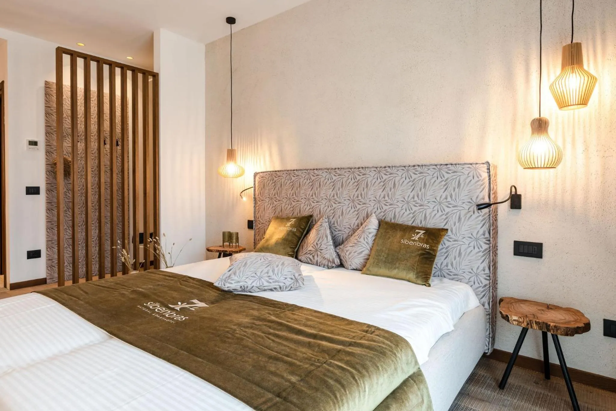 Bed in Sibenbras Natural Aparthotel