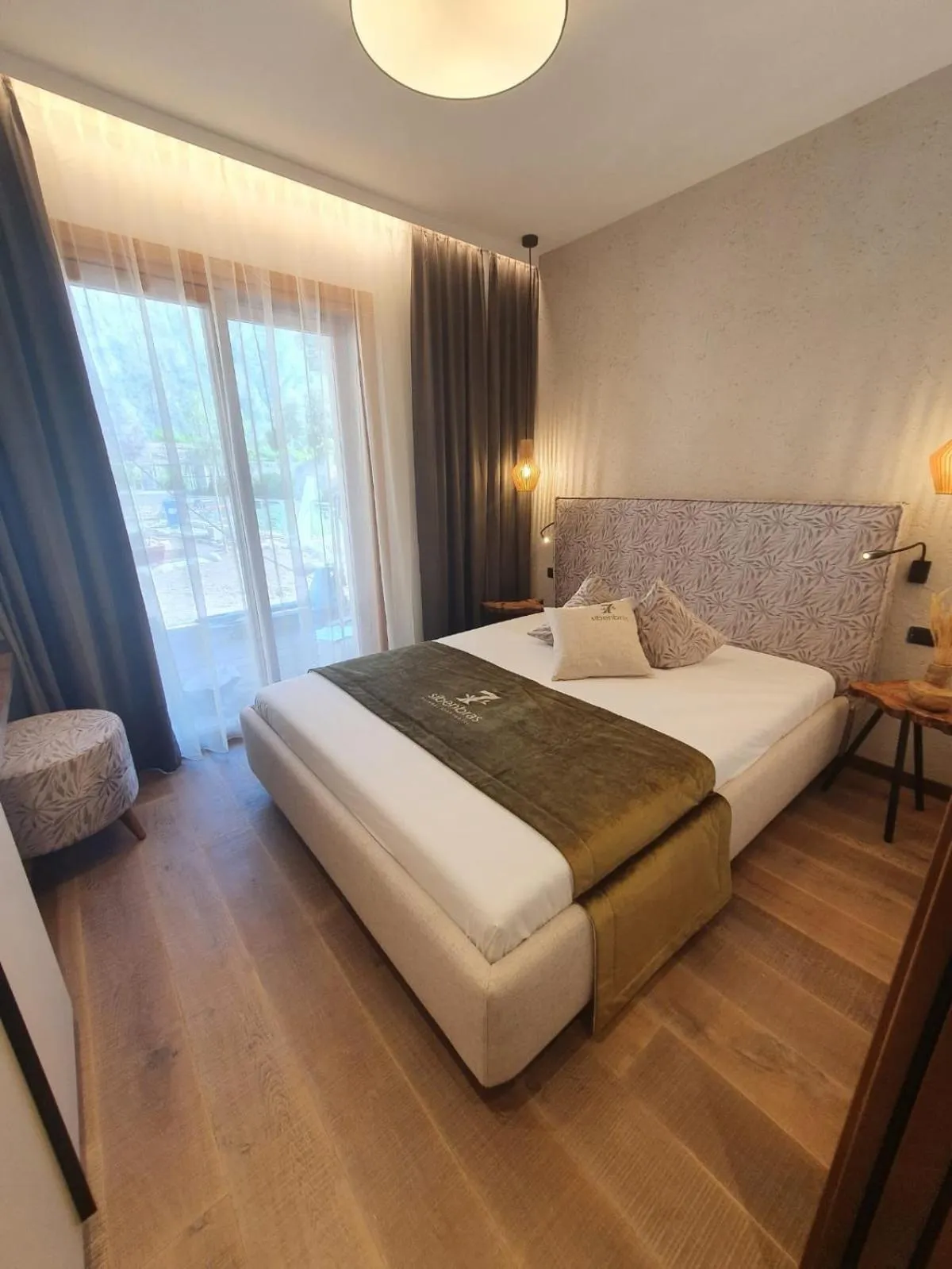 Bed in Sibenbras Natural Aparthotel