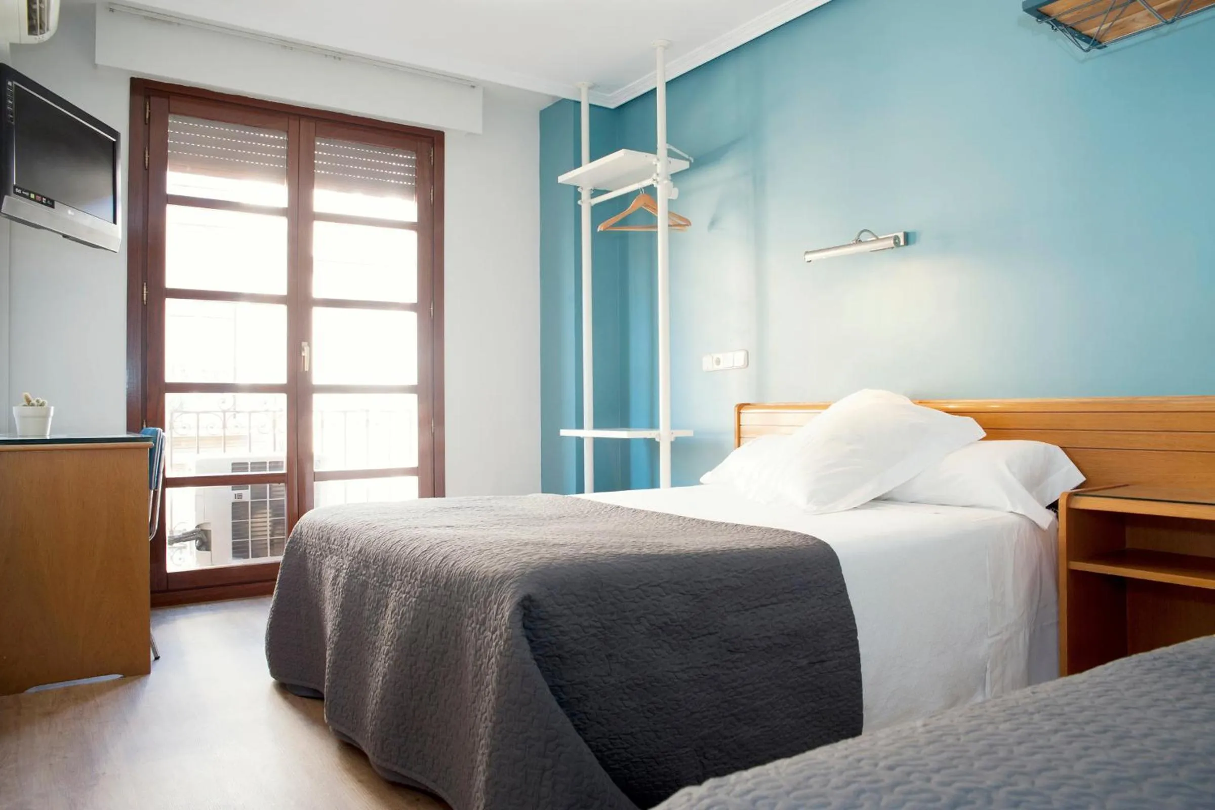 Bedroom, Bed in Apartamentos Sabinas Don Jaime