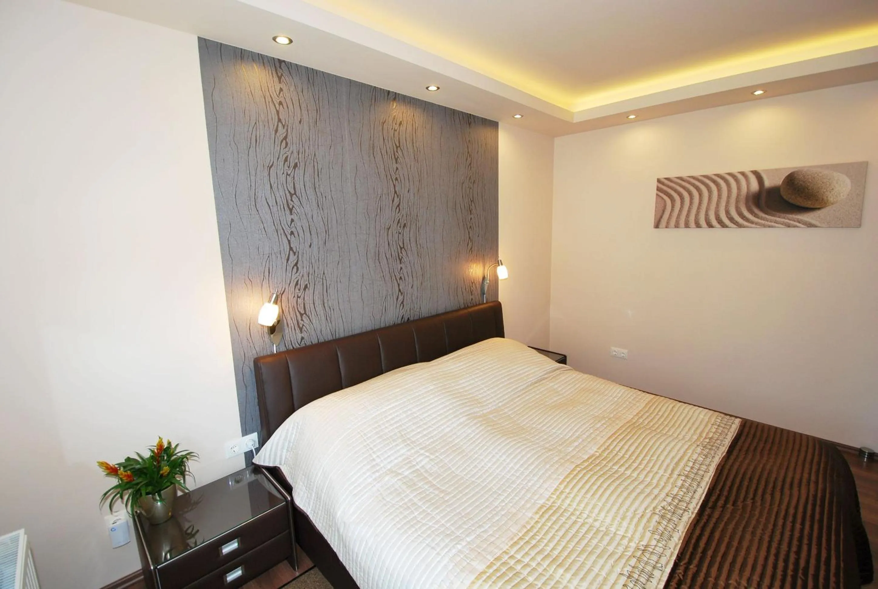 Bed in Arpad Bridge Apartments