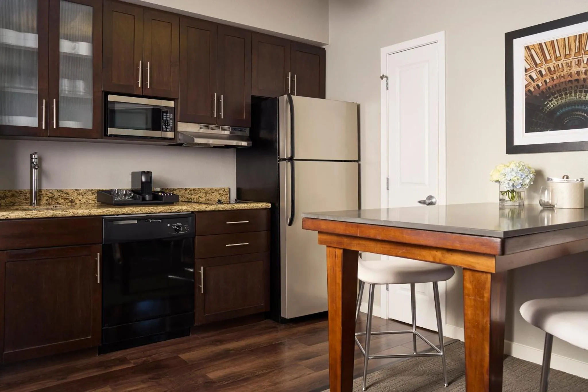 Kitchen or kitchenette in Archer Hotel Falls Church