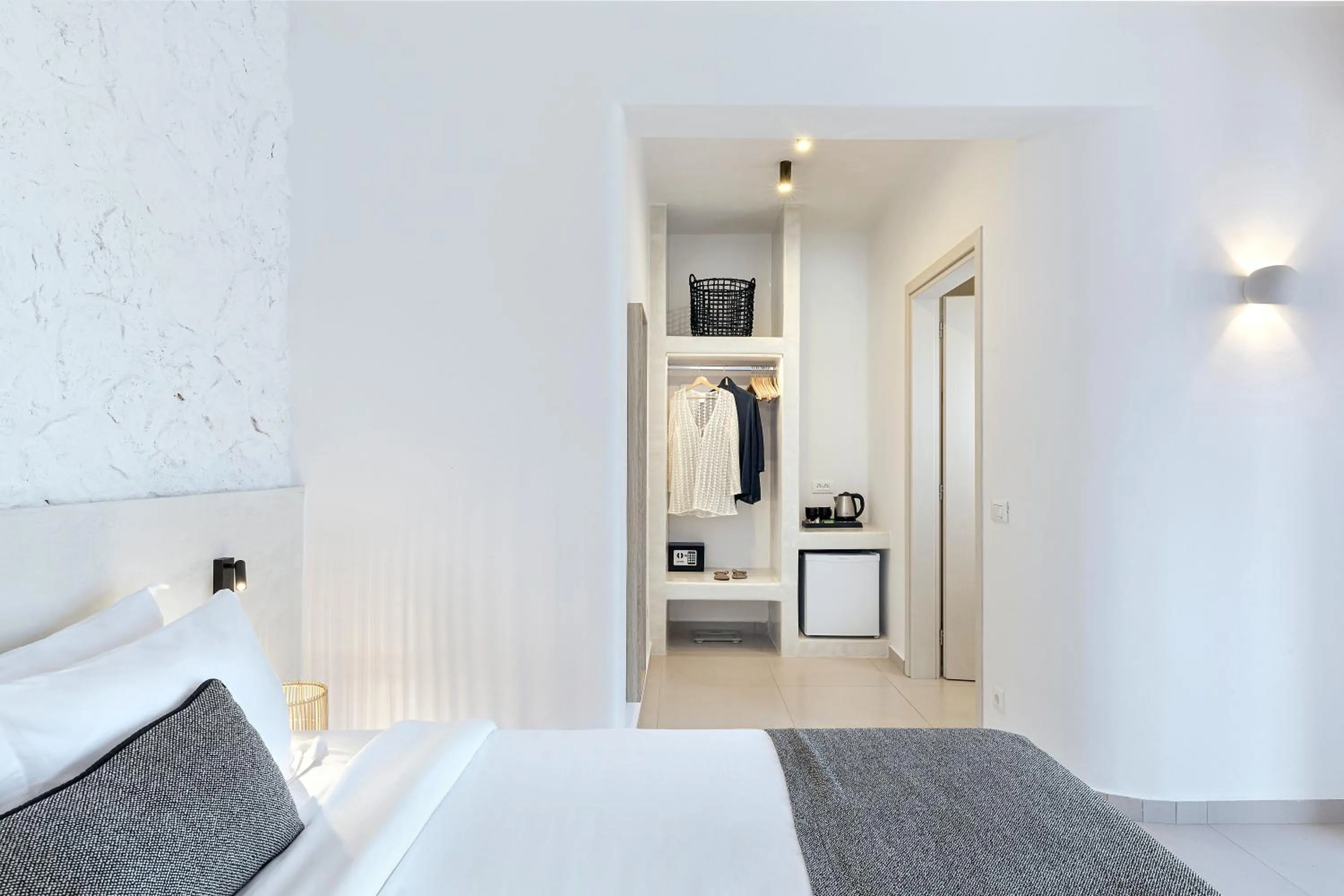 Bed in Onyx Hotel & Suites