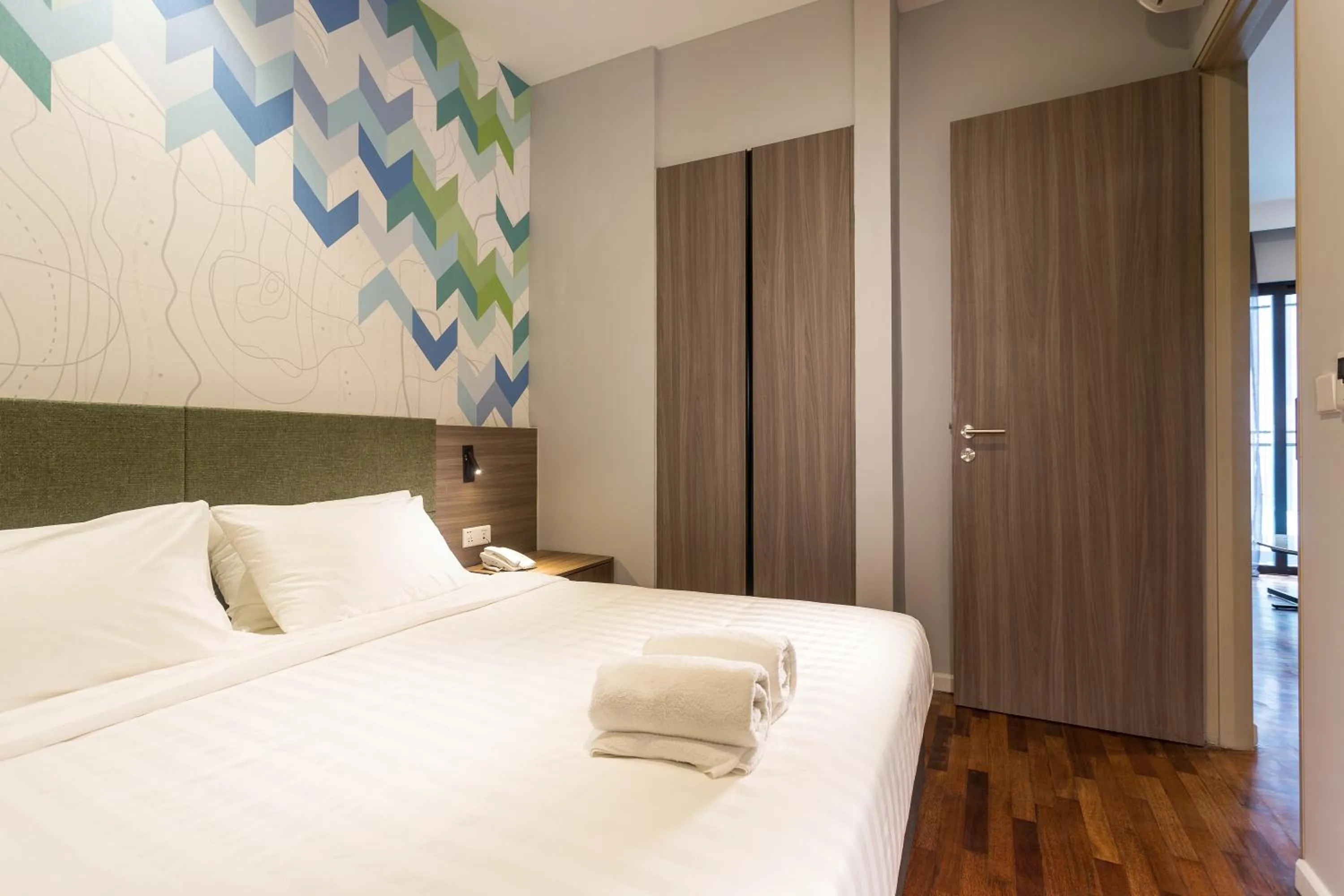 Bed in Le Vert Boutique Hotel