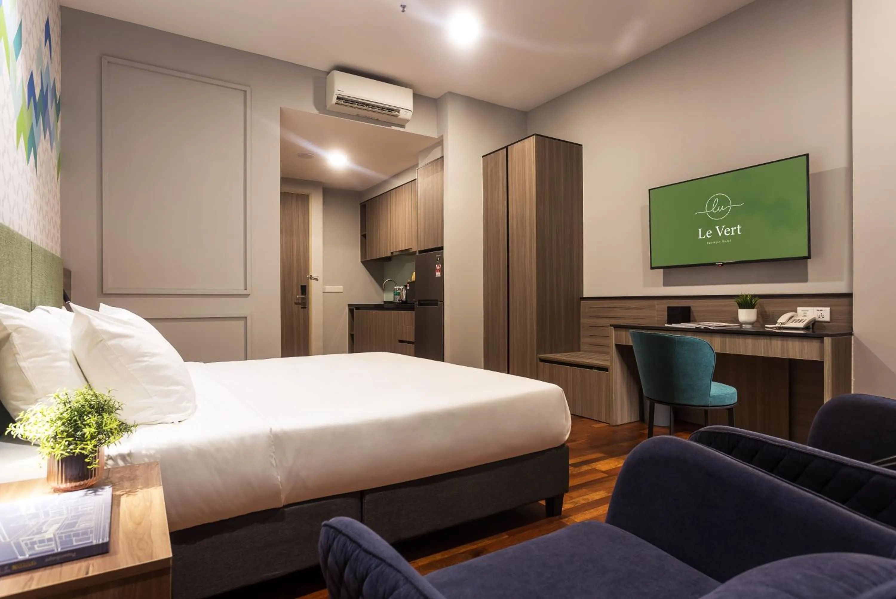 Bed in Le Vert Boutique Hotel