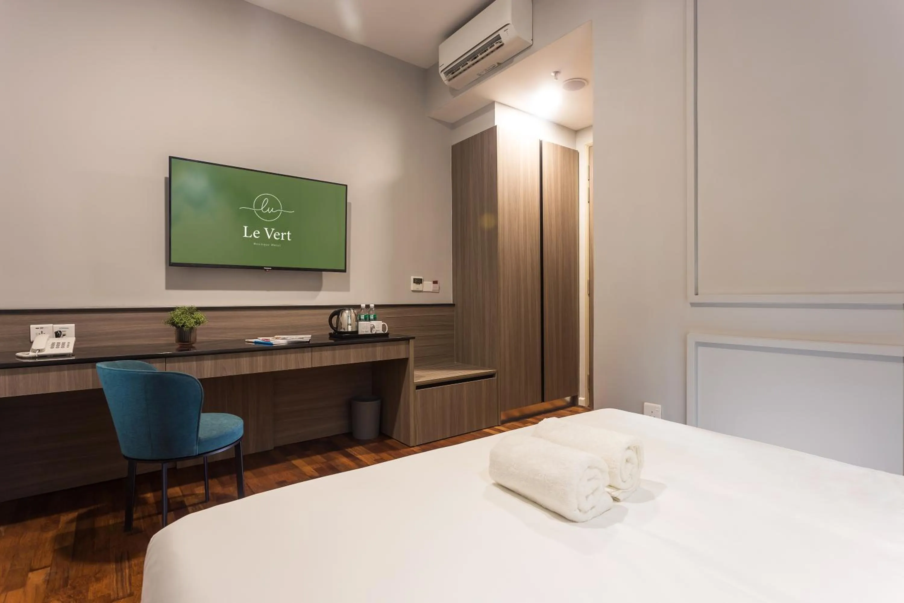 Bed in Le Vert Boutique Hotel