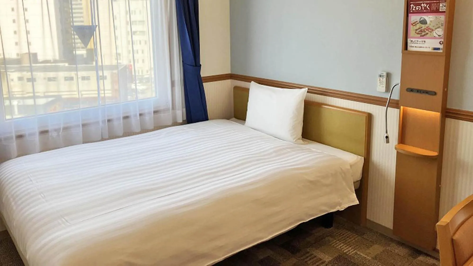 Bed in Toyoko Inn Toyama eki Shinkansen guchi No 1