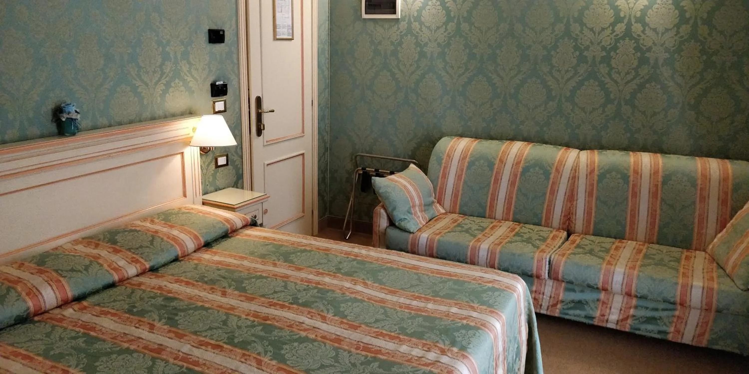 Bed in Hotel Villa Delle Palme