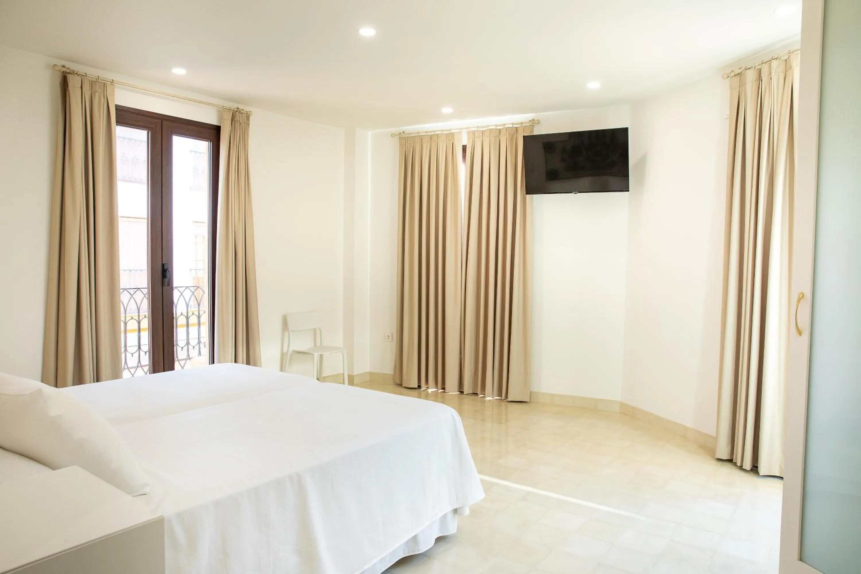 Photo of the whole room, Bed in Posada Boutique El Gallo Morón